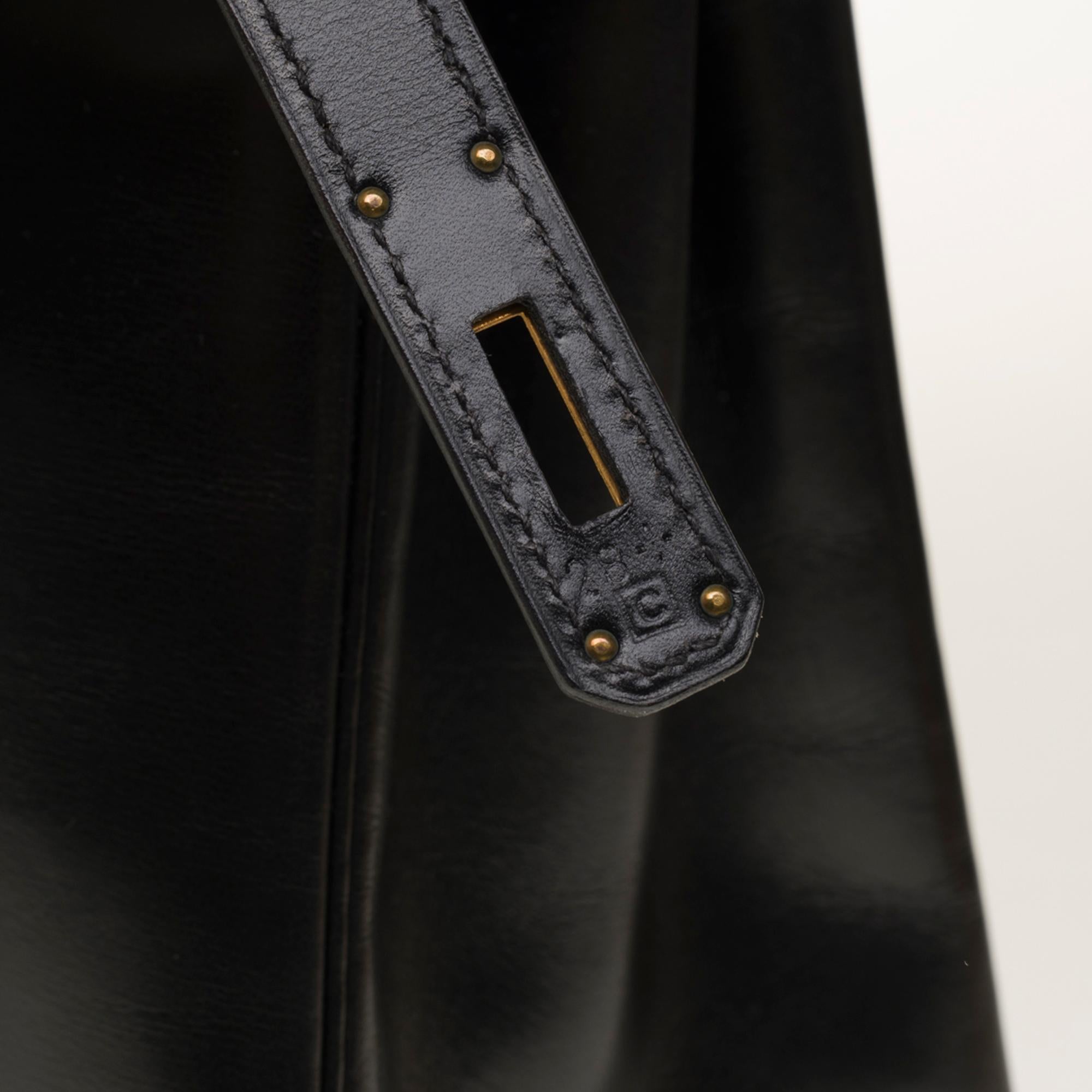 Rare Hermès Kelly 35 retourné handbag with strap in Black Calf leather, GHW In Excellent Condition In Paris, IDF