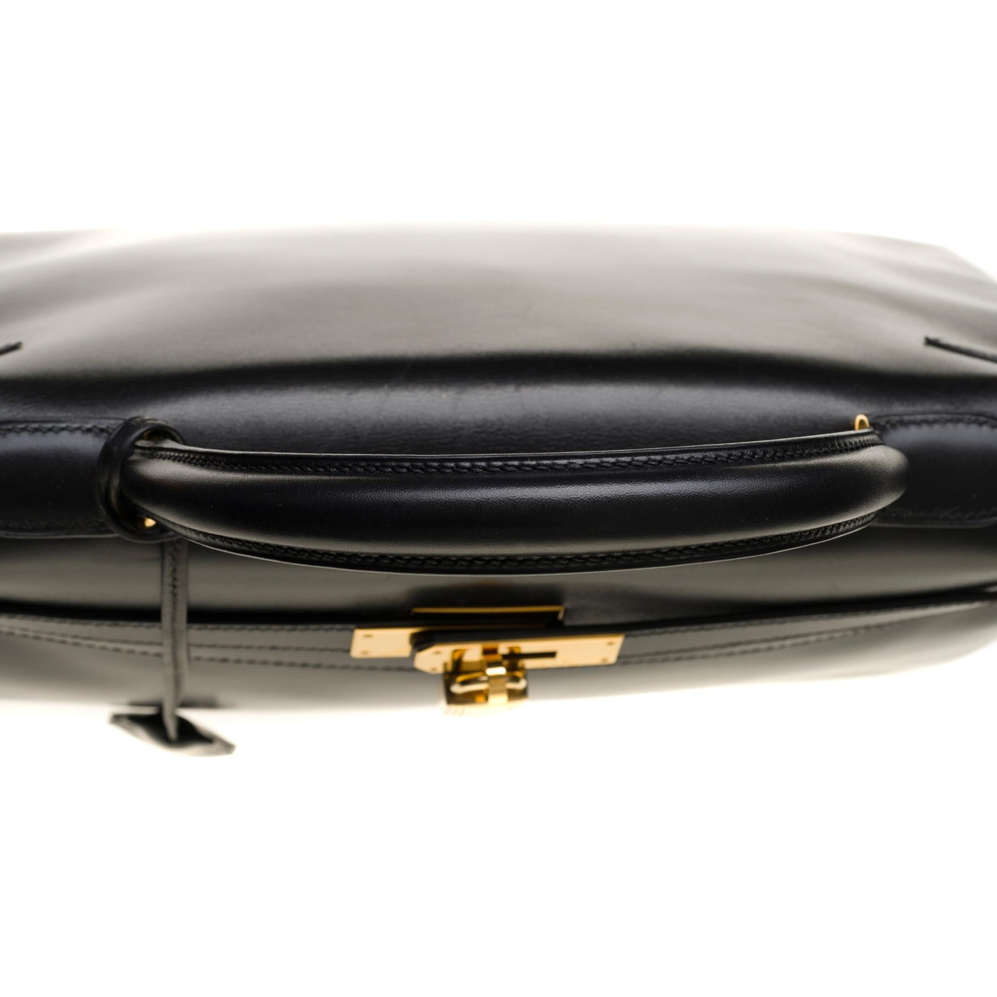 Rare Hermès Kelly 35 retourné handbag with strap in Black Calf leather, GHW 1