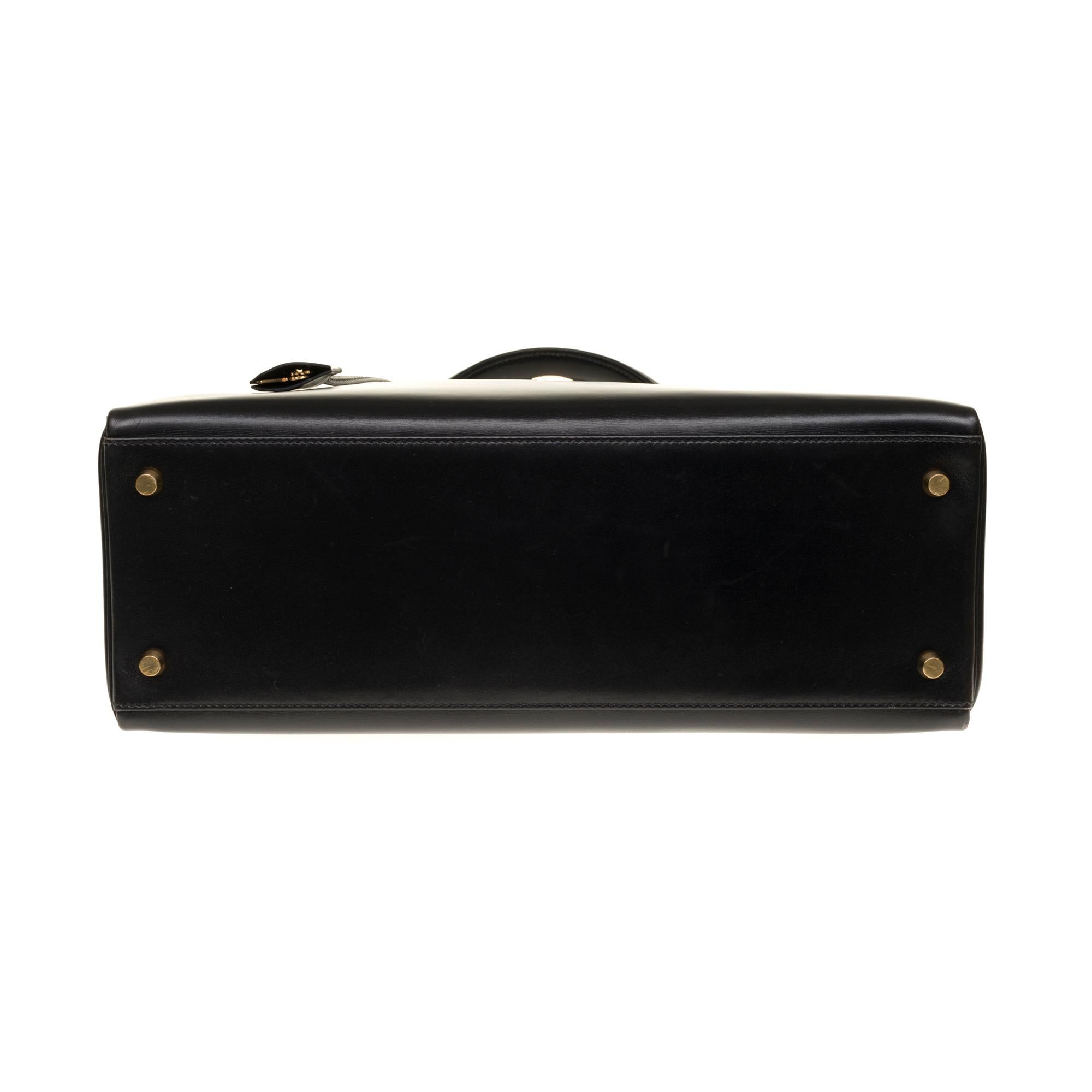 Rare Hermès Kelly 35 retourné handbag with strap in Black Calf leather, GHW 2