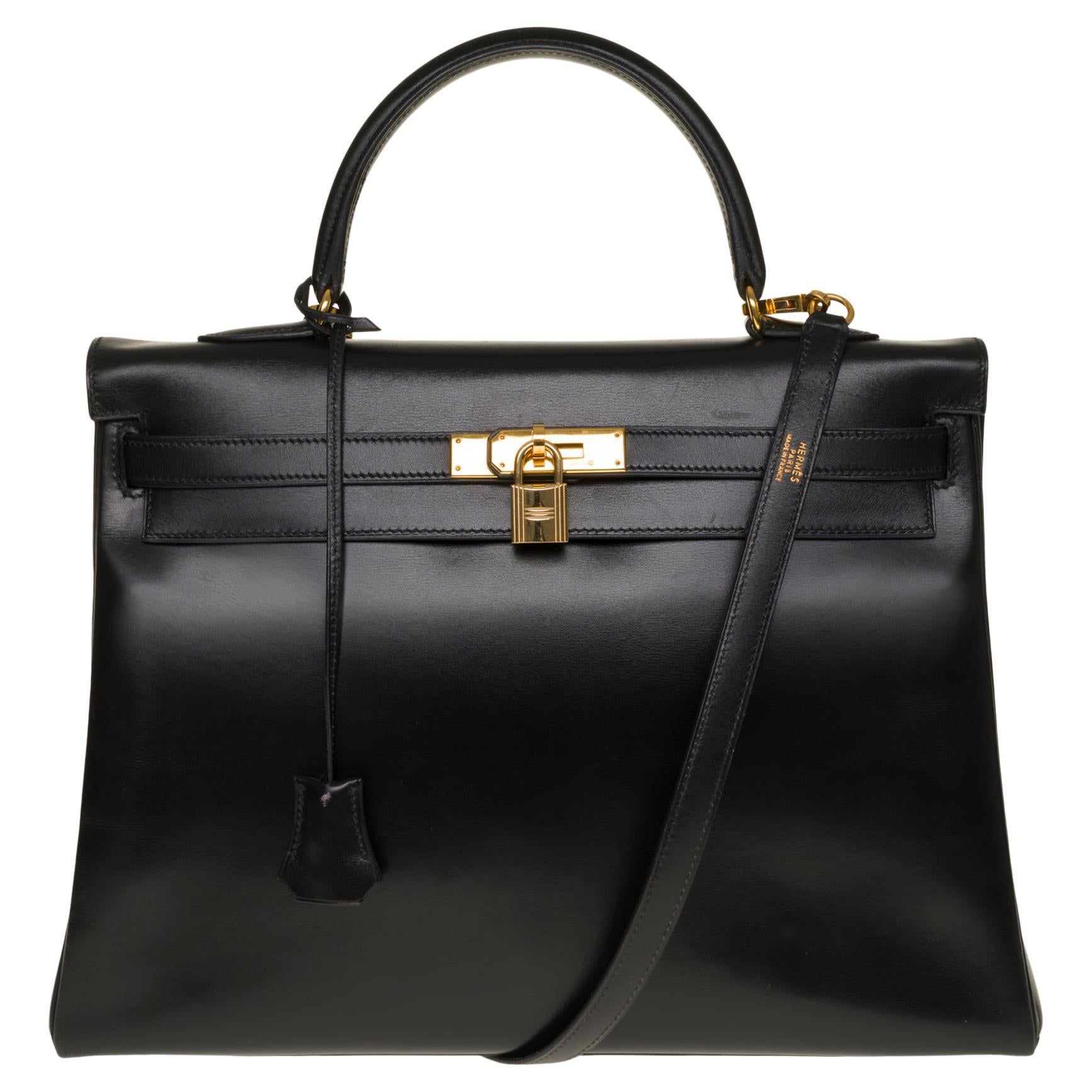 Rare Hermès Kelly 35 retourné handbag with strap in Black Calf leather, GHW