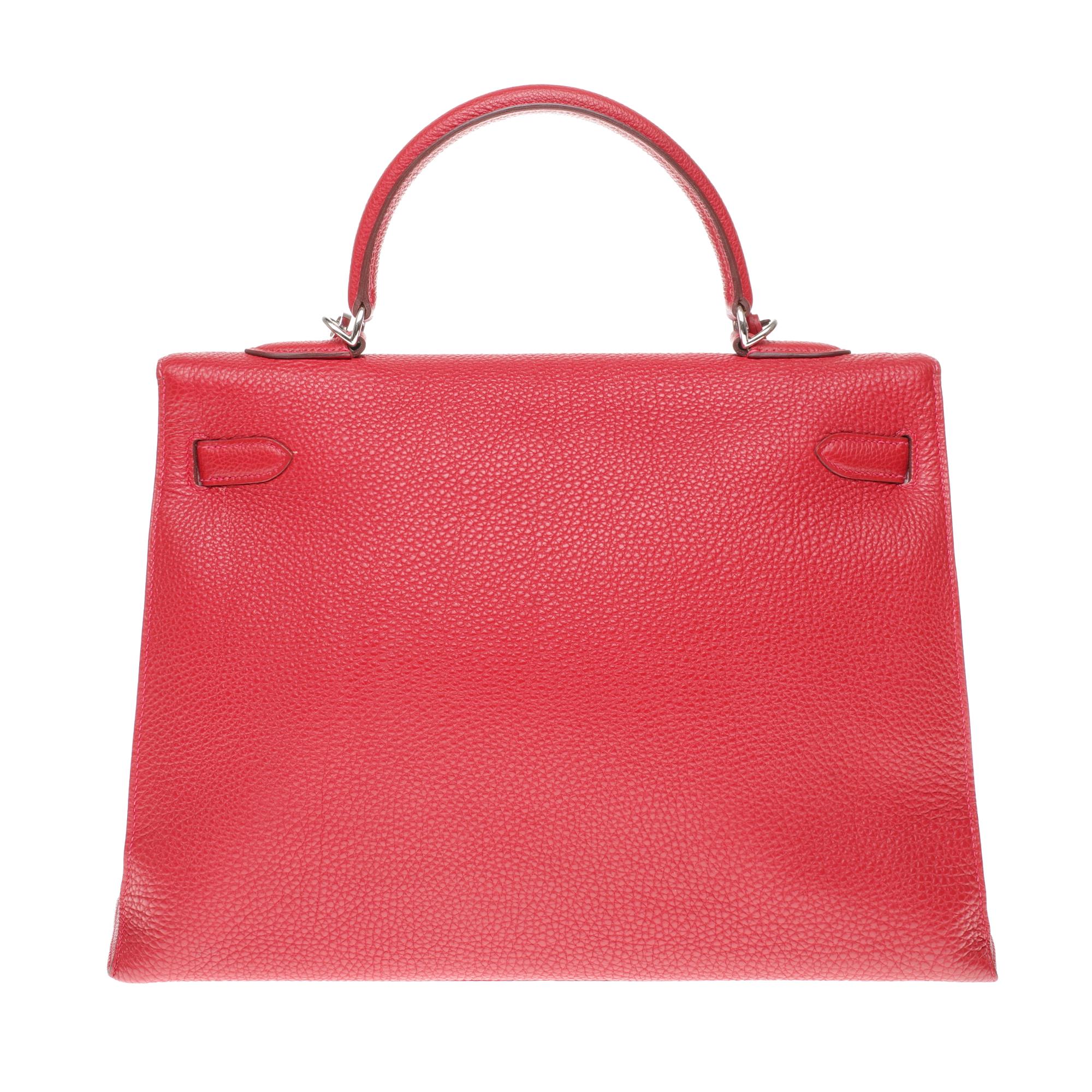 Rare Kelly in Togo leather and saddle stitching in such a bright color!

Beautiful Hermes Kelly 32 cm saddle-stitched bag in red Togo leather with silver plated metal , removable shoulder strap in red Togo, single red leather handle for a handheld