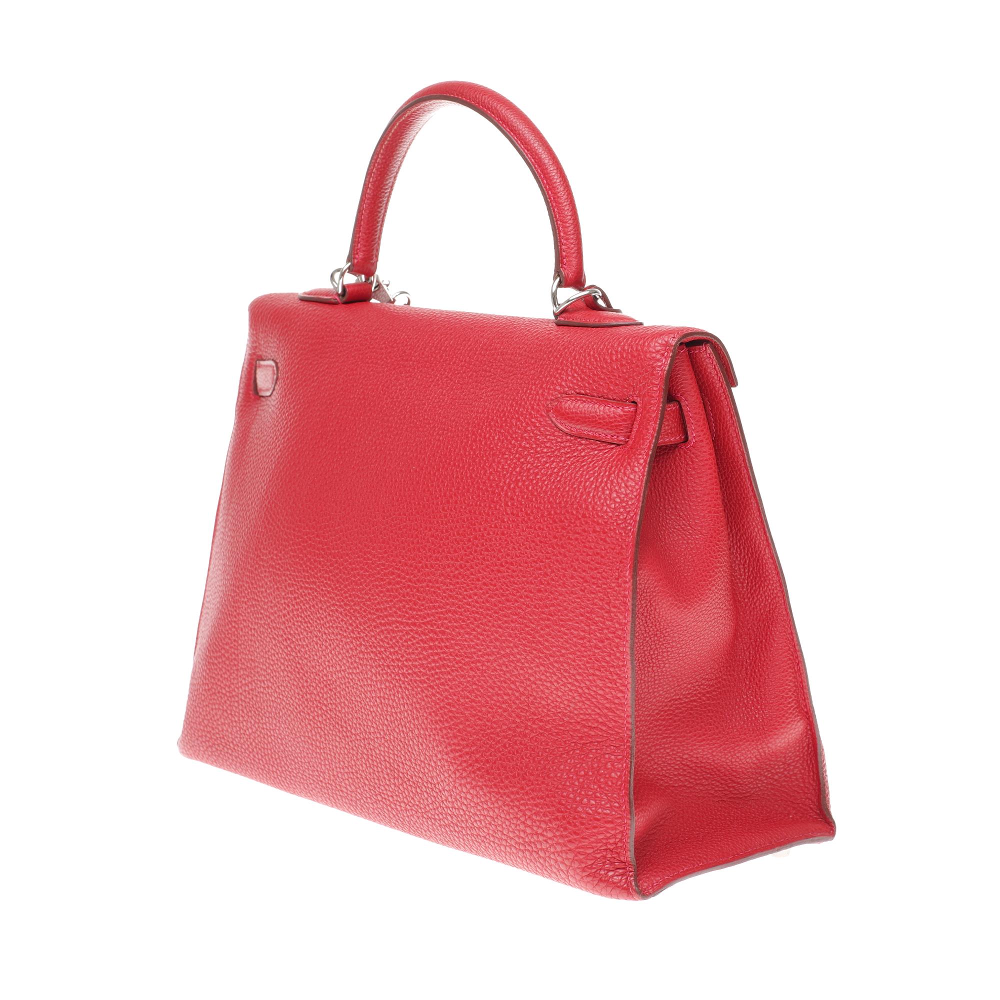 Red Rare Hermès Kelly 35 sellier shoulder bag in red togo leather, silver hardware