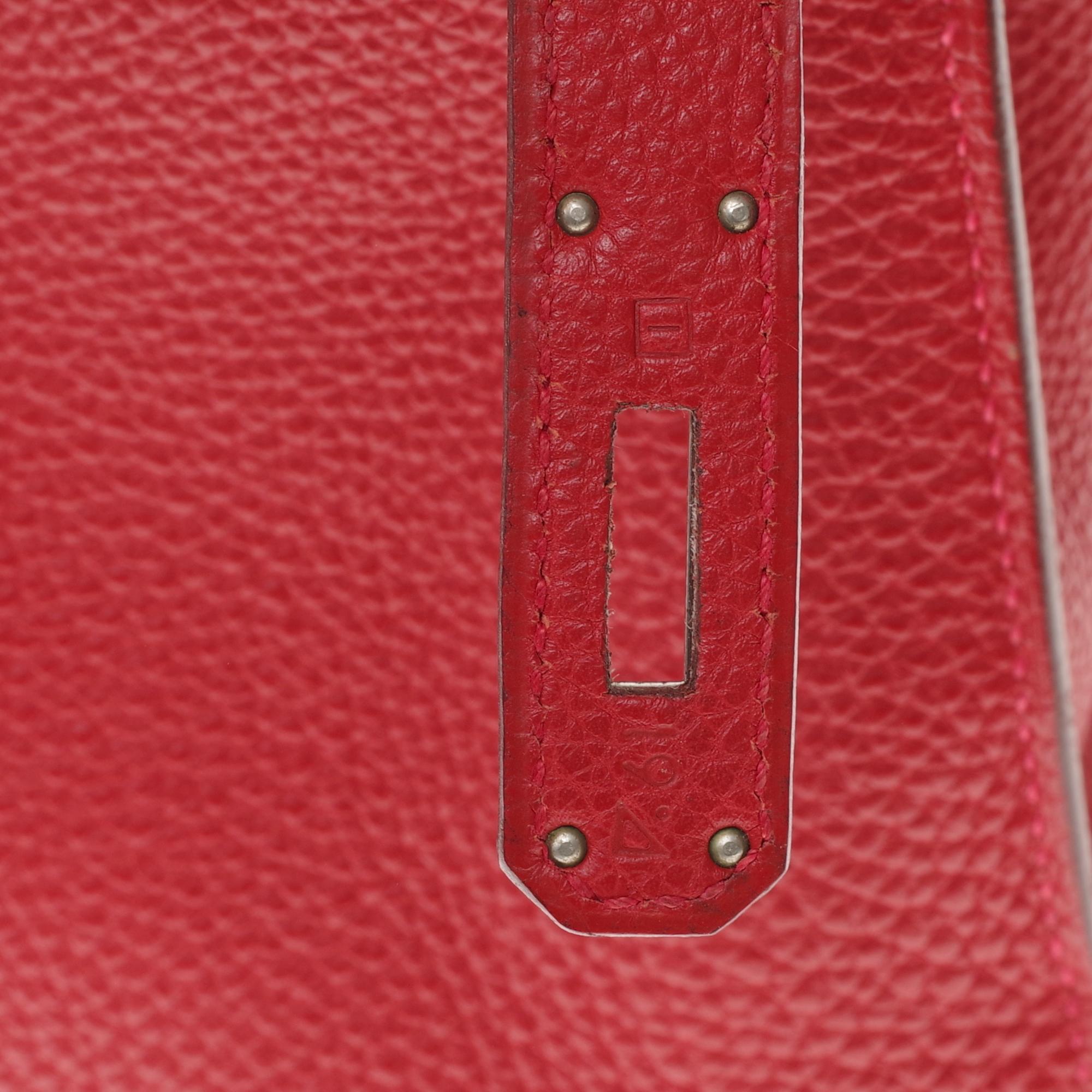 Rare Hermès Kelly 35 sellier shoulder bag in red togo leather, silver hardware 1