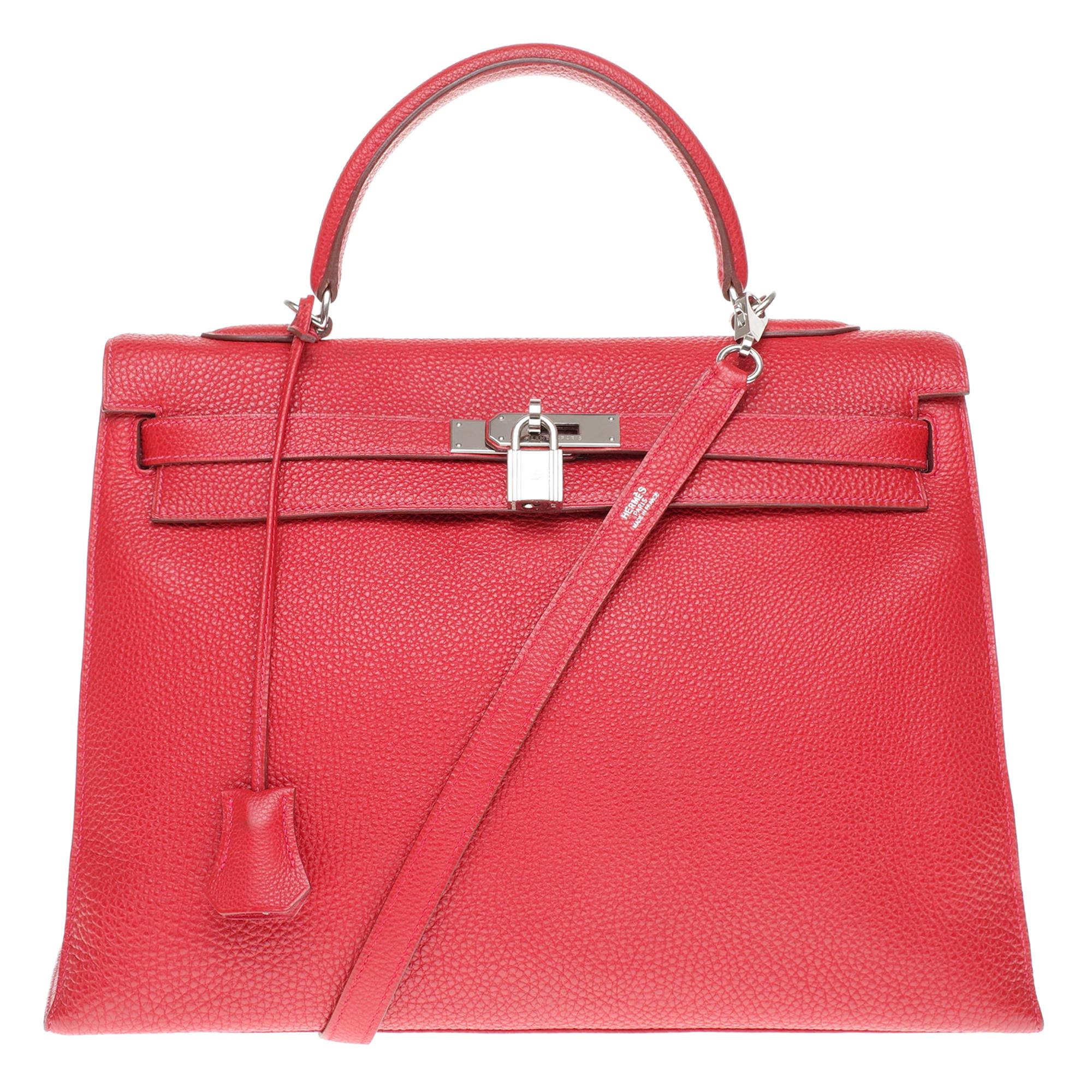 Rare Hermès Kelly 35 sellier shoulder bag in red togo leather, silver hardware