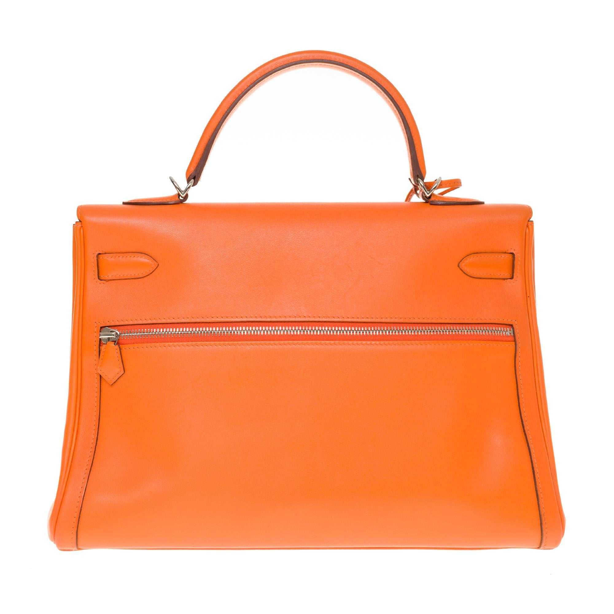 Superb und Rare Hermes Kelly Lakis 35 cm Tasche in orange swift Kalbsleder:: versilbert Palladium plattiert Metall trimmen:: einfache orange Ledergriff:: eine abnehmbare orange Leder Schultergurt Griff ermöglicht eine Hand oder Schulter zu