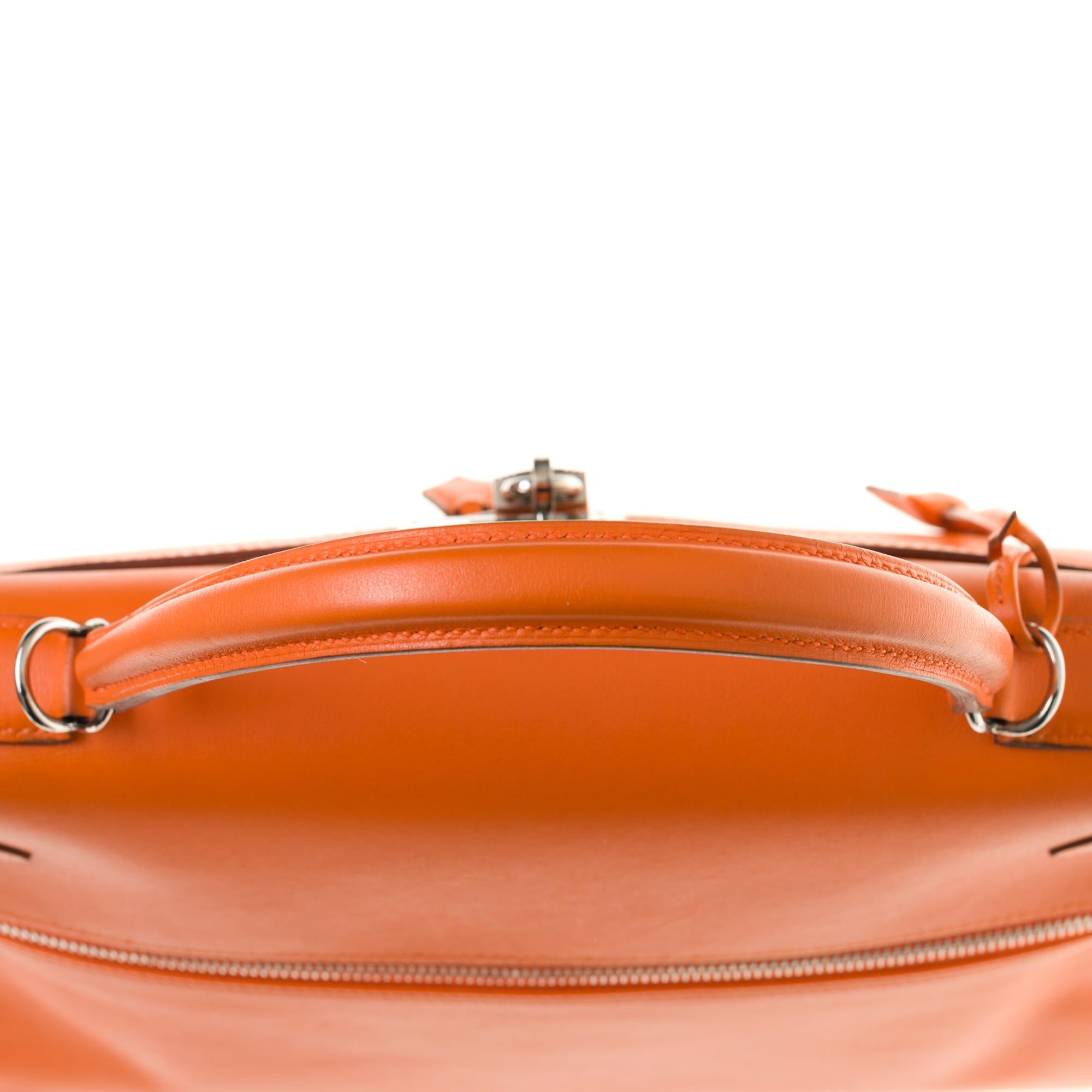 Rare Hermès Kelly Lakis 35 handbag with strap in orange swift calf leather, PHW 1