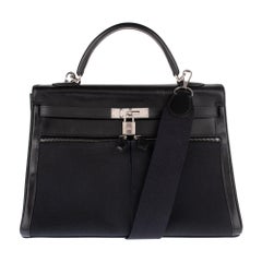 Rare Hermès Kelly Lakis 35 handbag with strap, PHW in very good condition!