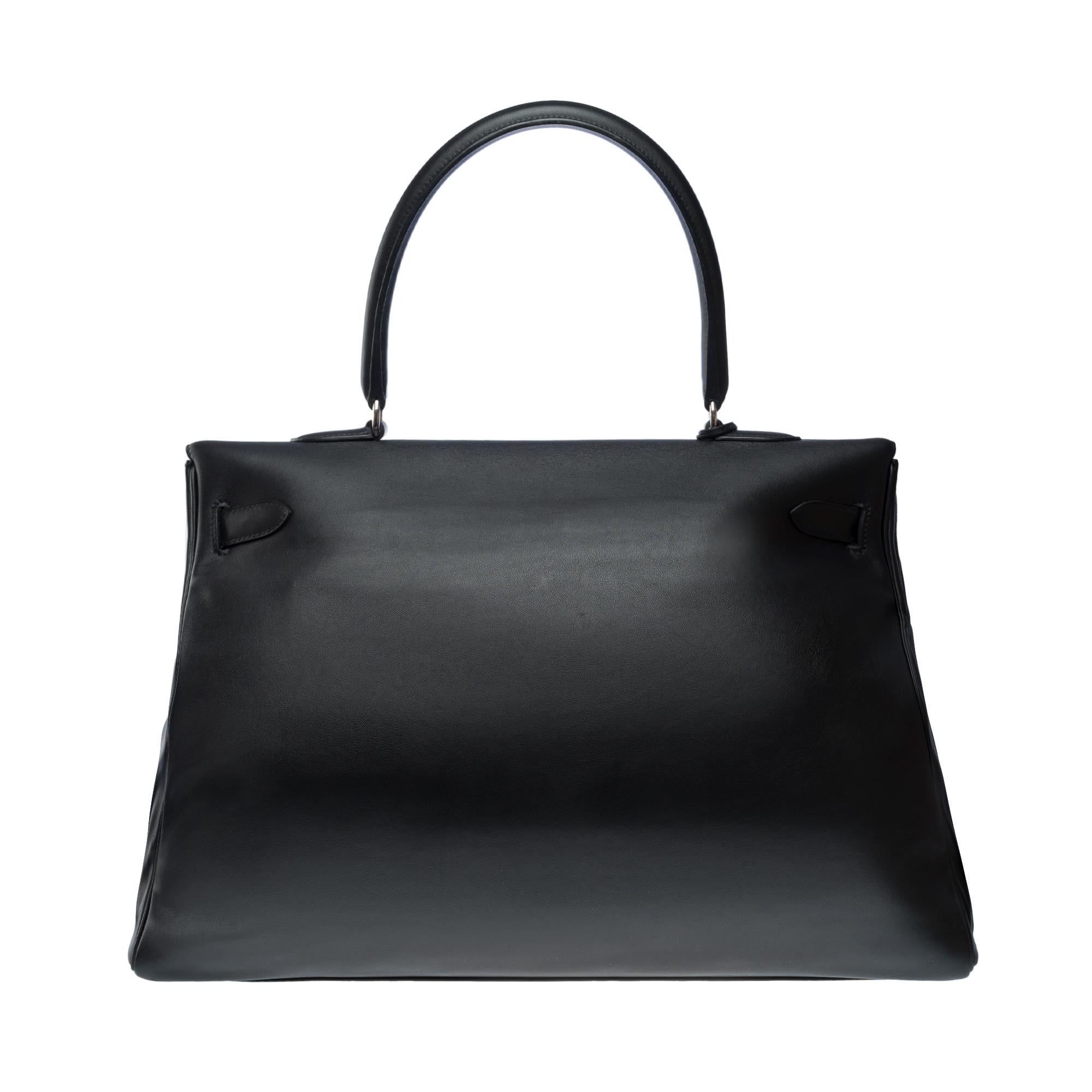 Rare Hermès Kelly Relax 50 retourne Week-end bag inBlack Swift leather, SHW In Good Condition In Paris, IDF