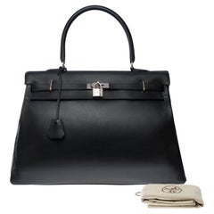 Rare Hermès Kelly Relax 50 retourne Week-end en cuir Swift noir, SHW