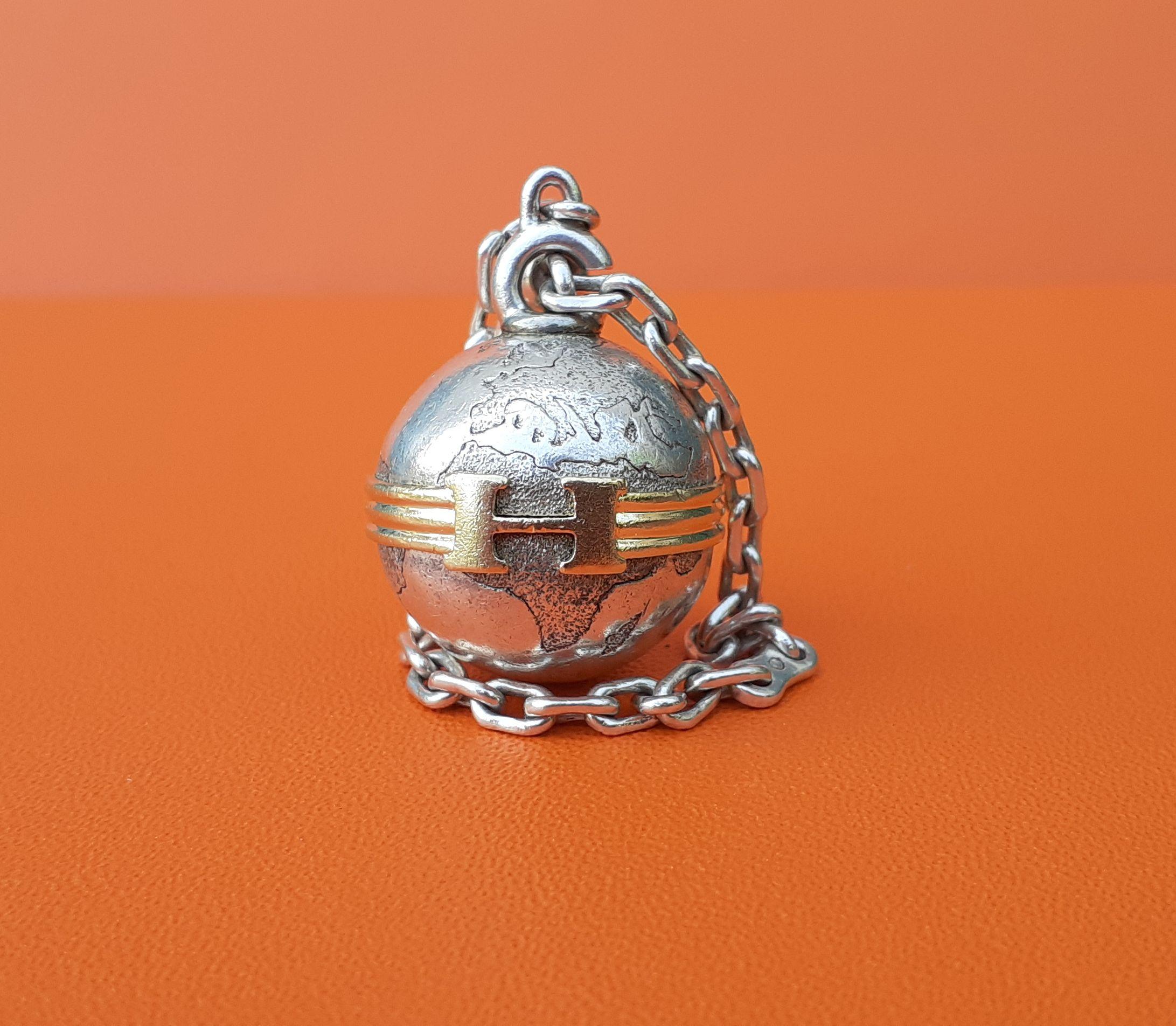 Women's or Men's Rare Hermès Keychain Key Holder Globe Shape in Silver  For Sale