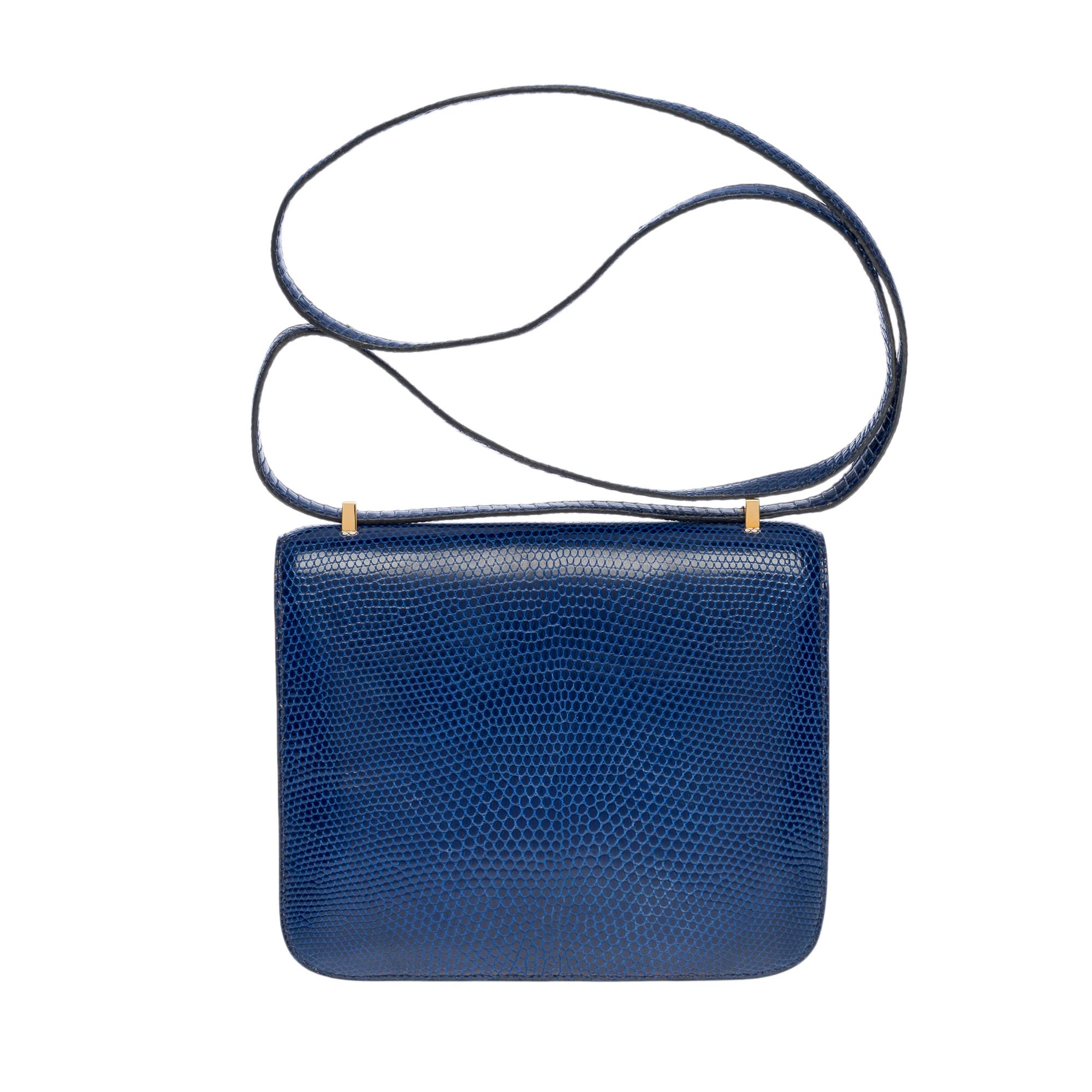 Exceptional & Rare Hermès Mini Constance 18 Shoulder bag in blue Sapphire Varanus Niloticus Lizard, gold plated metal hardware, blue lizard leather Shoulder Strap

Logo closure on flap
Blue leather lining, two compartments, two patch
