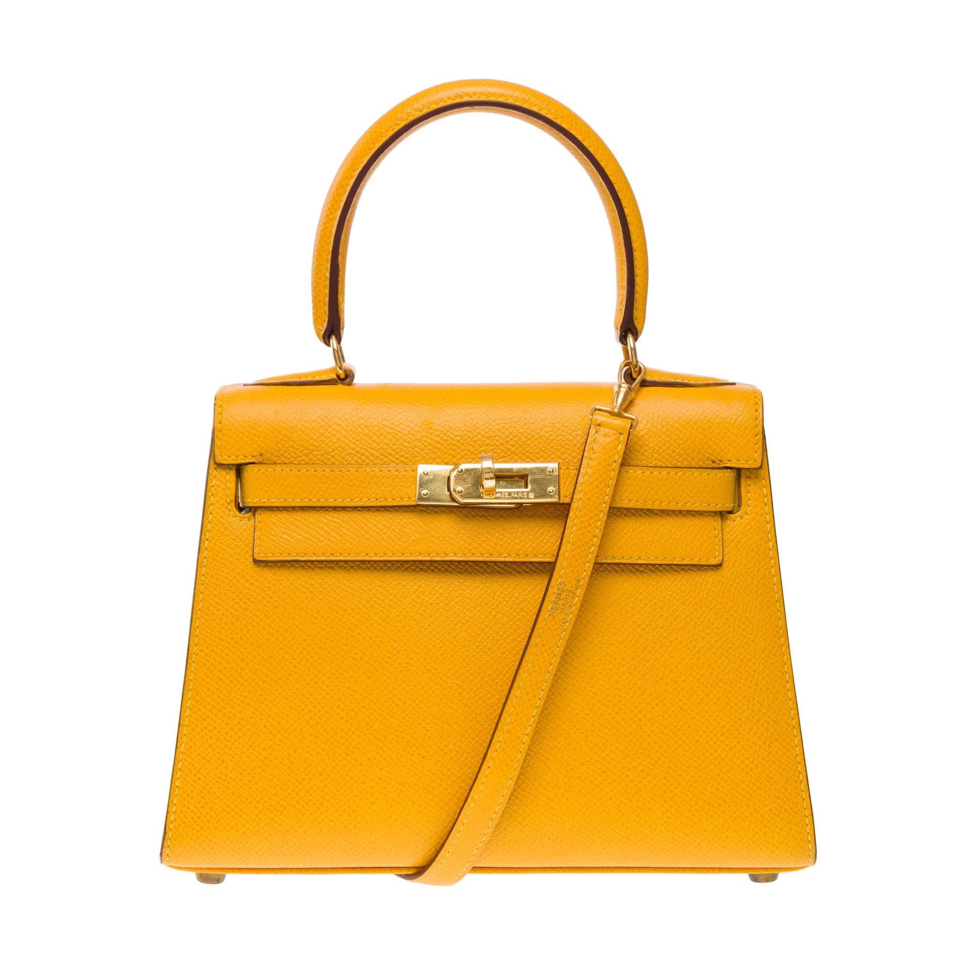 Exceptional​ ​&​ ​Rare​ ​Handbag​ ​Hermes​ ​Kelly​ ​Mini​ ​20​ ​cm​ ​in​ ​amber​ ​yellow​ ​Courchevel​ ​leather,​ ​gold​ ​plated​ ​metal​ ​trim,​ ​yellow​ ​Courchevel​ ​leather​ ​handle,​ ​yellow​ ​Courchevel​ ​shoulder​ ​strap​ ​for​ ​a​ ​hand​