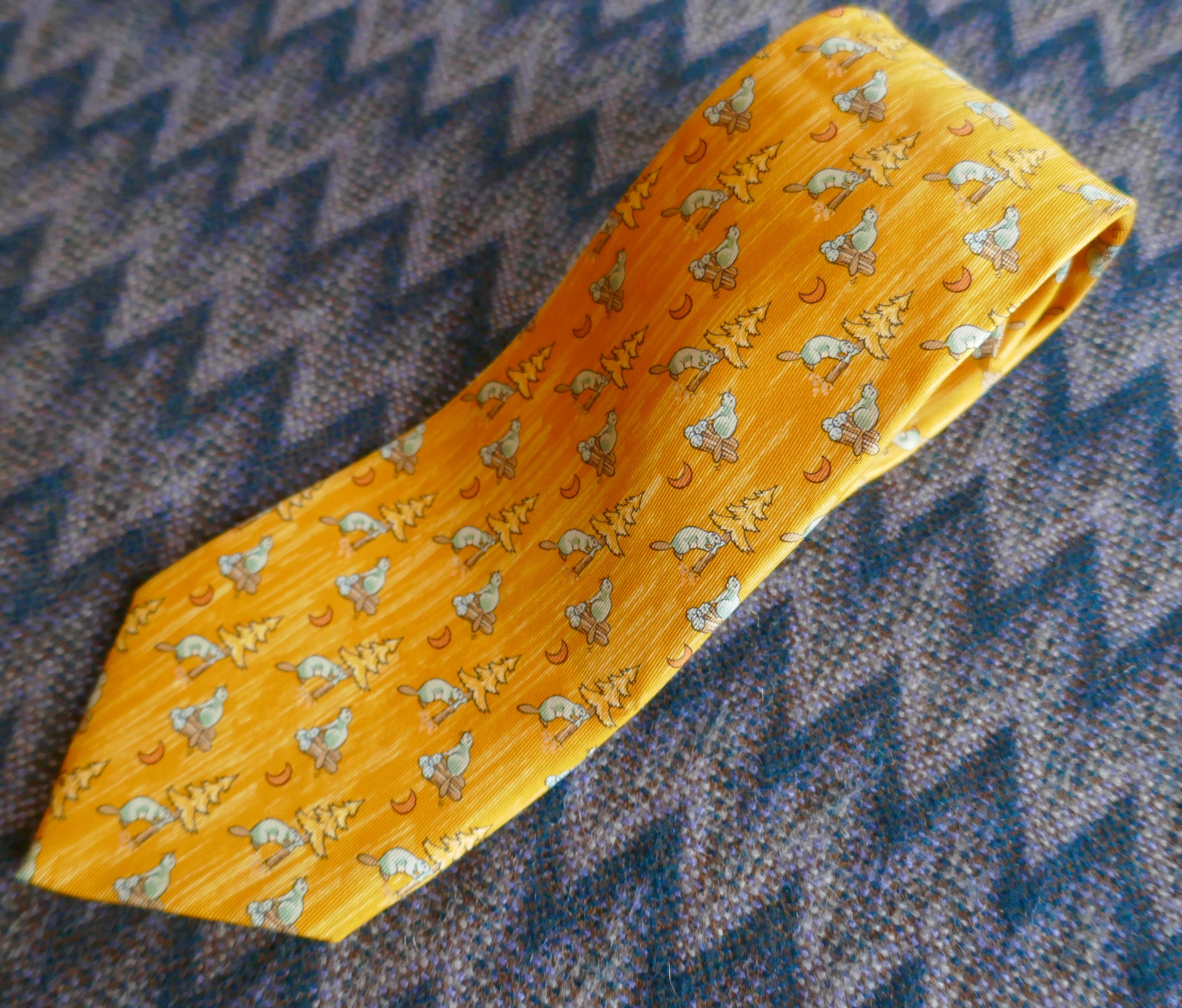 Rare Hermes Novelty Silk Tie, Beavers Felling Trees, Hermes Orange Pallet 

Classic Hermes All Over Winter design, Beavers felling trees
Hermes Orange pallet 
A Very Special tie, instantly recognisable as Hermes by those in the know
100% silk 
Silk