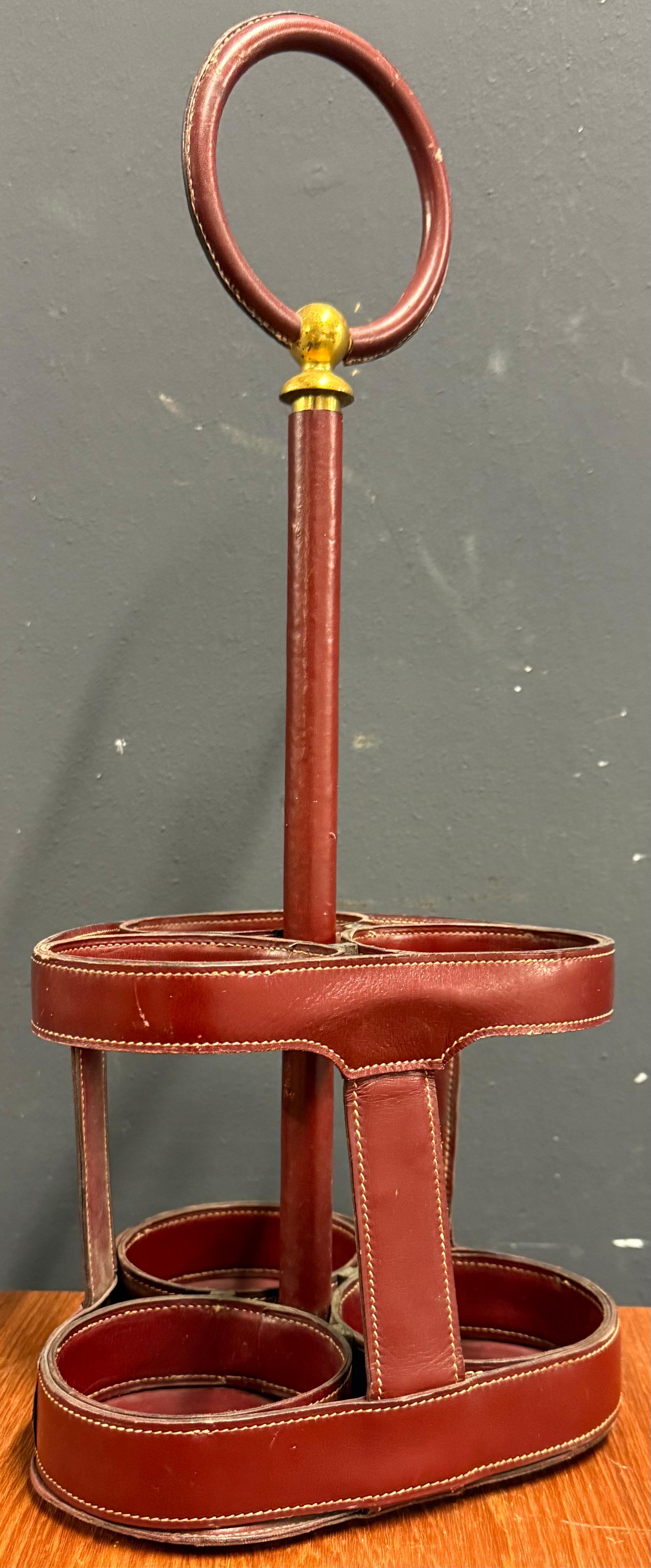 Increíble portabotellas o soporte Hermes. atribuido a jacques adnet.
