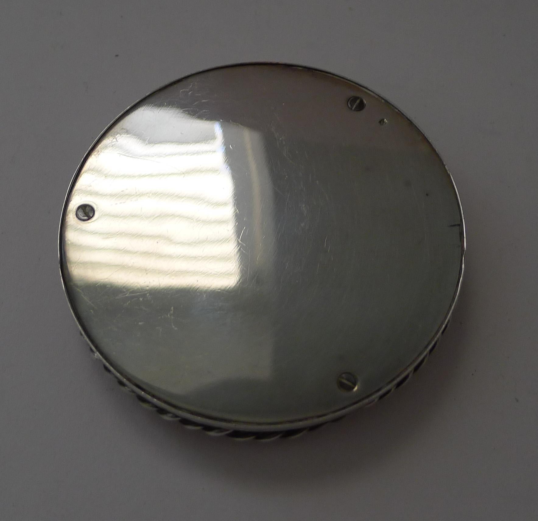Sourced in France, this magnificent desk compass by the iconic French fashion house, Hermès of Paris is a rare find dating to c.1960.

Made from solid French silver having the 1st title Minerva hallmark for 950/1000 parts silver together with the