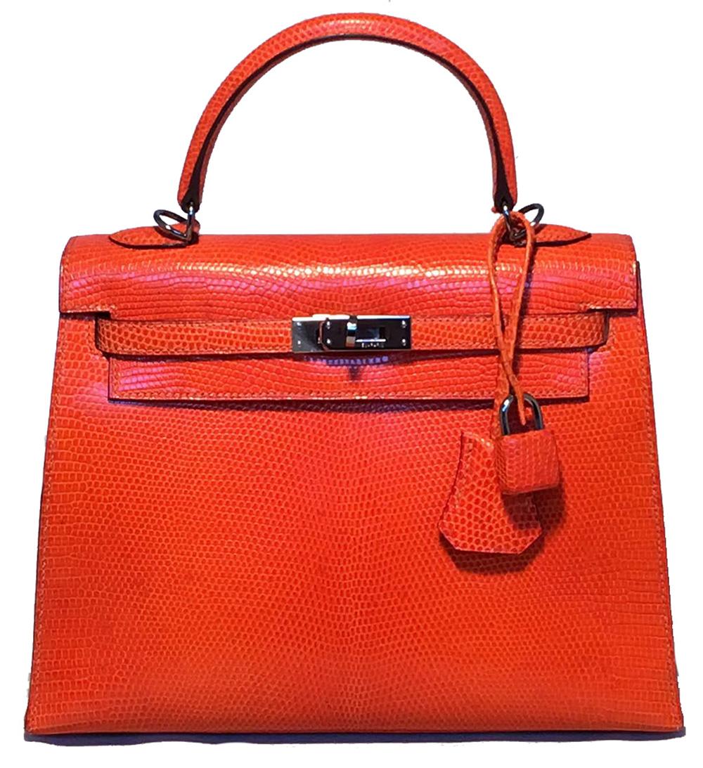 RARE Hermes Tangerine Orange Shiny Niloticus Lizard Leather 25cm Kelly Bag in very good condition. Rare, limited edition, tangerine orange shiny niloticus lizard leather exterior trimmed with silver ruthenium hardware and matching lizard leather