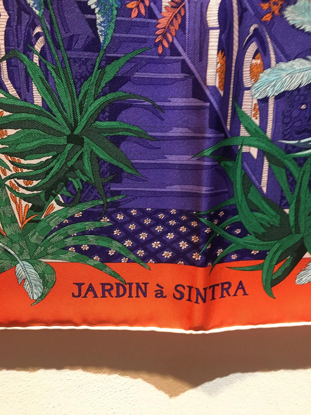 Rare Hermes Vintage Jardin à Sintra Silk Scarf in Orange c1995 in excellent condition. Original silk screen design c1995 by anne fairve features a beautiful illustration of an indian temple in the jungle. The temple is in dark royal blue/purple and