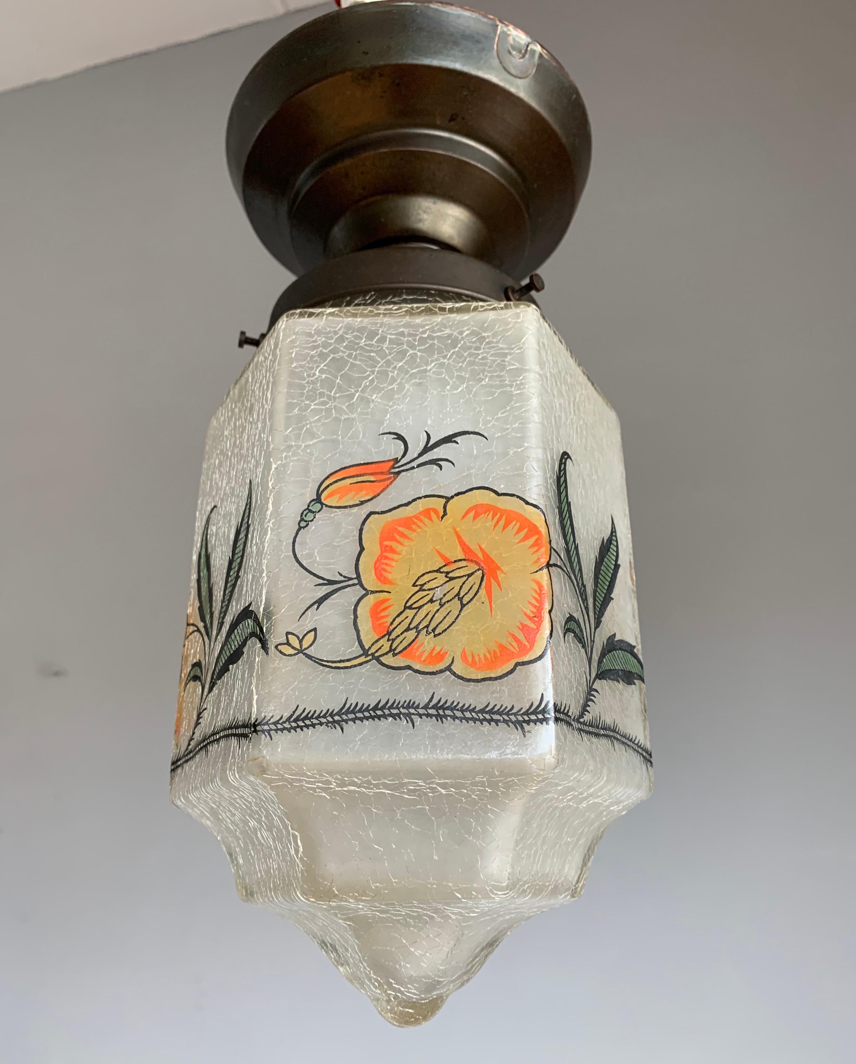 Very beautiful light fixture with a flower 'decor' in the finest of natural colors.

This rare, beautifully designed and very finely decorated pendant is destined to grace someone's entrance, landing or bedroom soon, because if you are looking for a