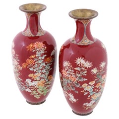 A Large Rare Pair Of Red Japanese Cloisonne Enamel Vases Gardens in Bloom Kawade