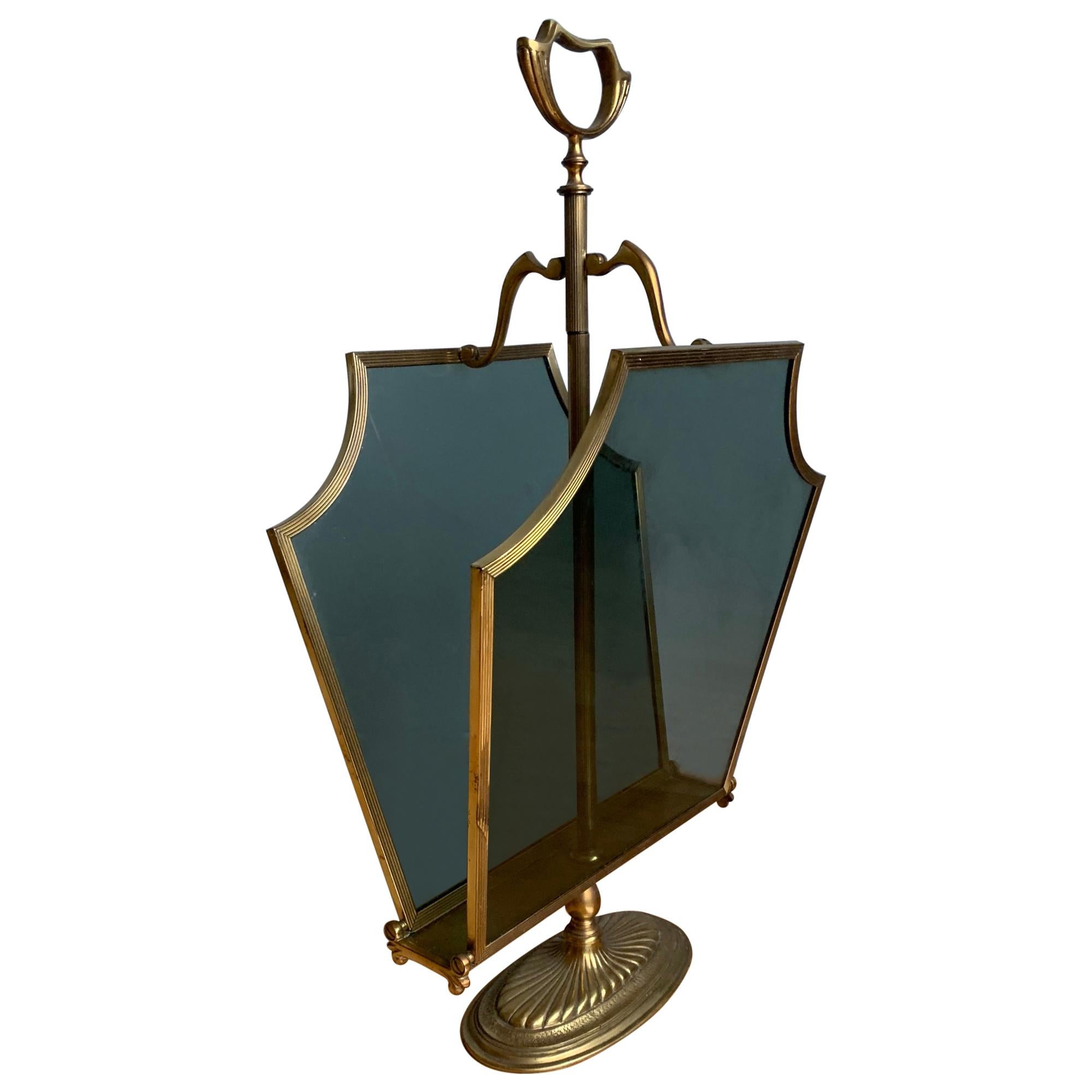 Raro portariviste o supporto in stile Hollywood Regency in bronzo, ottone e vetro fumé