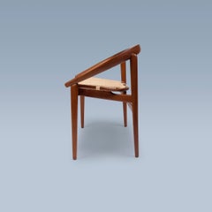 Petite Danish modern sofa with horseshoe curved teak and woven light cane seat