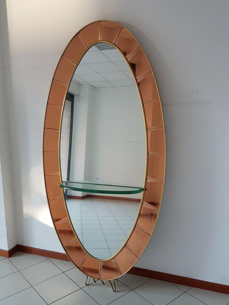 Rare huge mirror from the 1960s, original Cristal Art production from Turin, intact in all its parts, imposing,
With its over 2 meters high (about 2.20 meters), with the shelf in Nile crystal

Load-bearing structure in wood, frames and moldings