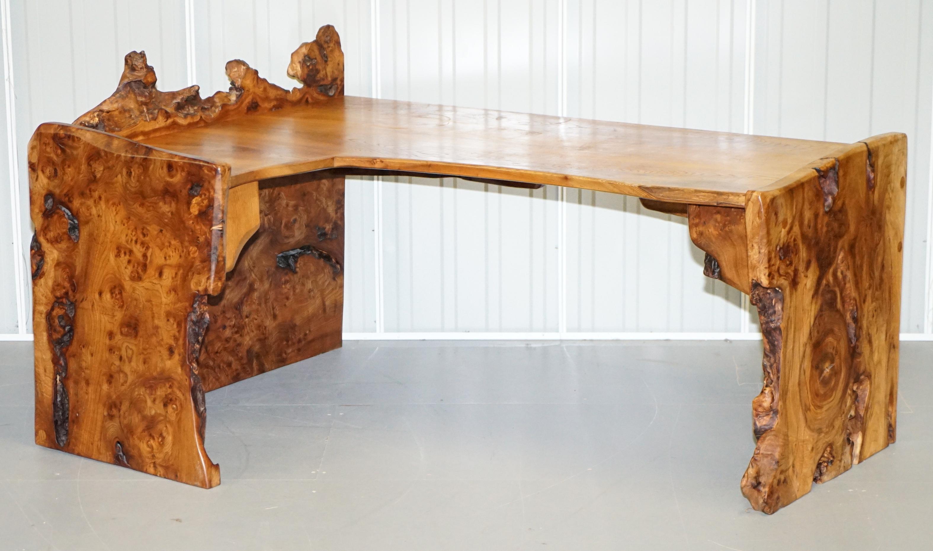 We are delighted to this stunning hand carved from solid bur elm writing desk table from the workshop of Tim Stead by the genius James McKeen

A very good looking and well made, it’s very natural working the functionality of the desk around the