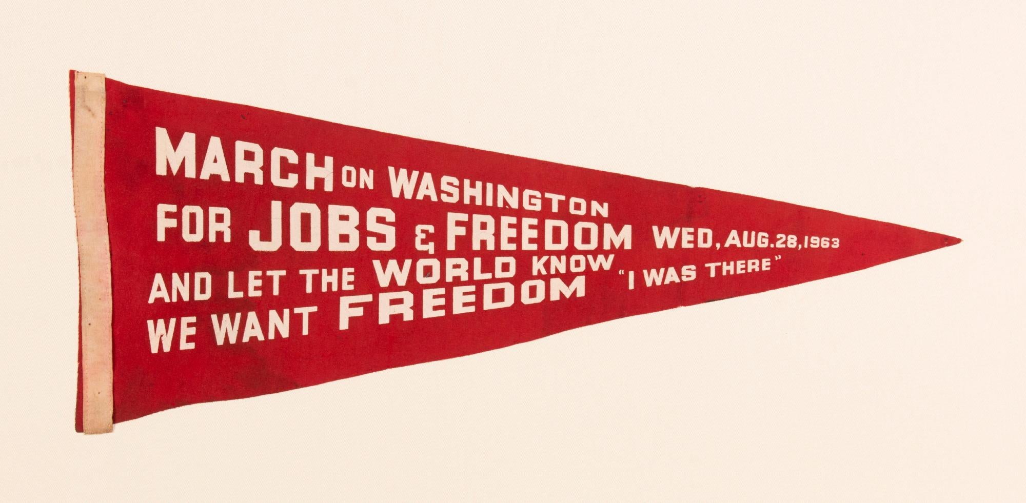 RARE FELT PENNANT FROM THE MARCH ON WASHINGTON, AUGUST 28, 1963, WHEN MARTIN LUTHER KING DELIVERED HIS HISTORIC 