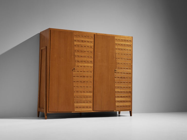Ico Parisi for Fratelli Rizzi, Intimiano, wardrobe, a desk from the same series referenced under cat. no, '1950.56', ash, Italy, 1950

This highly refined armoire is designed by the acknowledged master of Italian mid-century design Ico Parisi