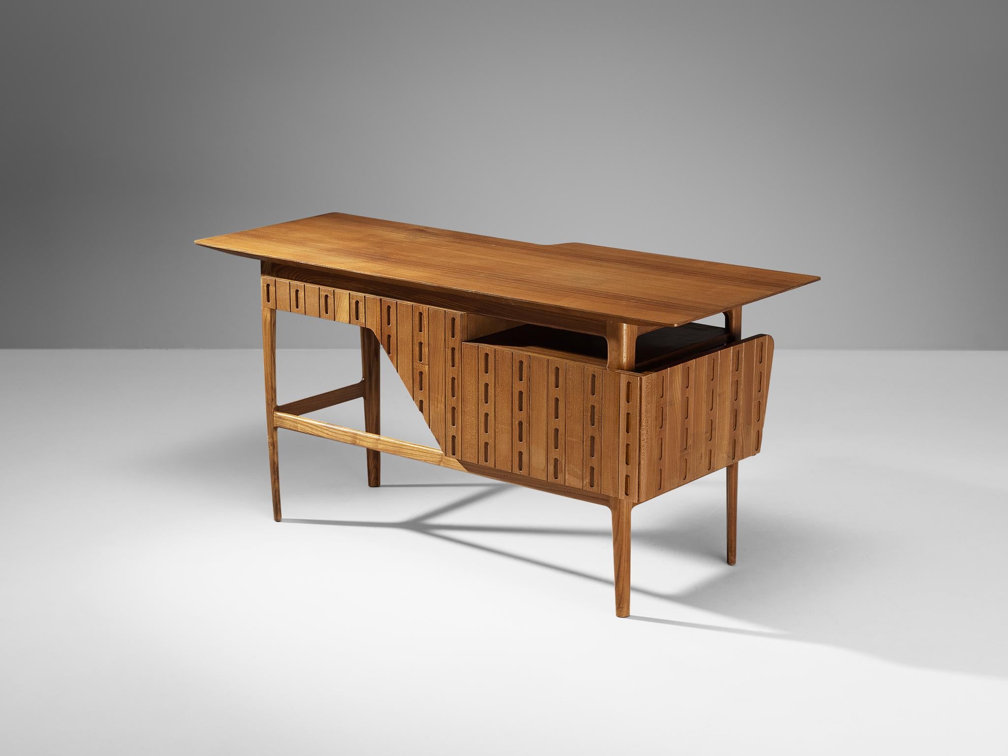 Ico Parisi for Fratelli Rizzi, Intimiano, writing desk, cat. no, '1950.56', chestnut, Italy, 1950

This highly refined writing table is designed by the acknowledged master of Italian mid-century design Ico Parisi (1916-1996). His design language is
