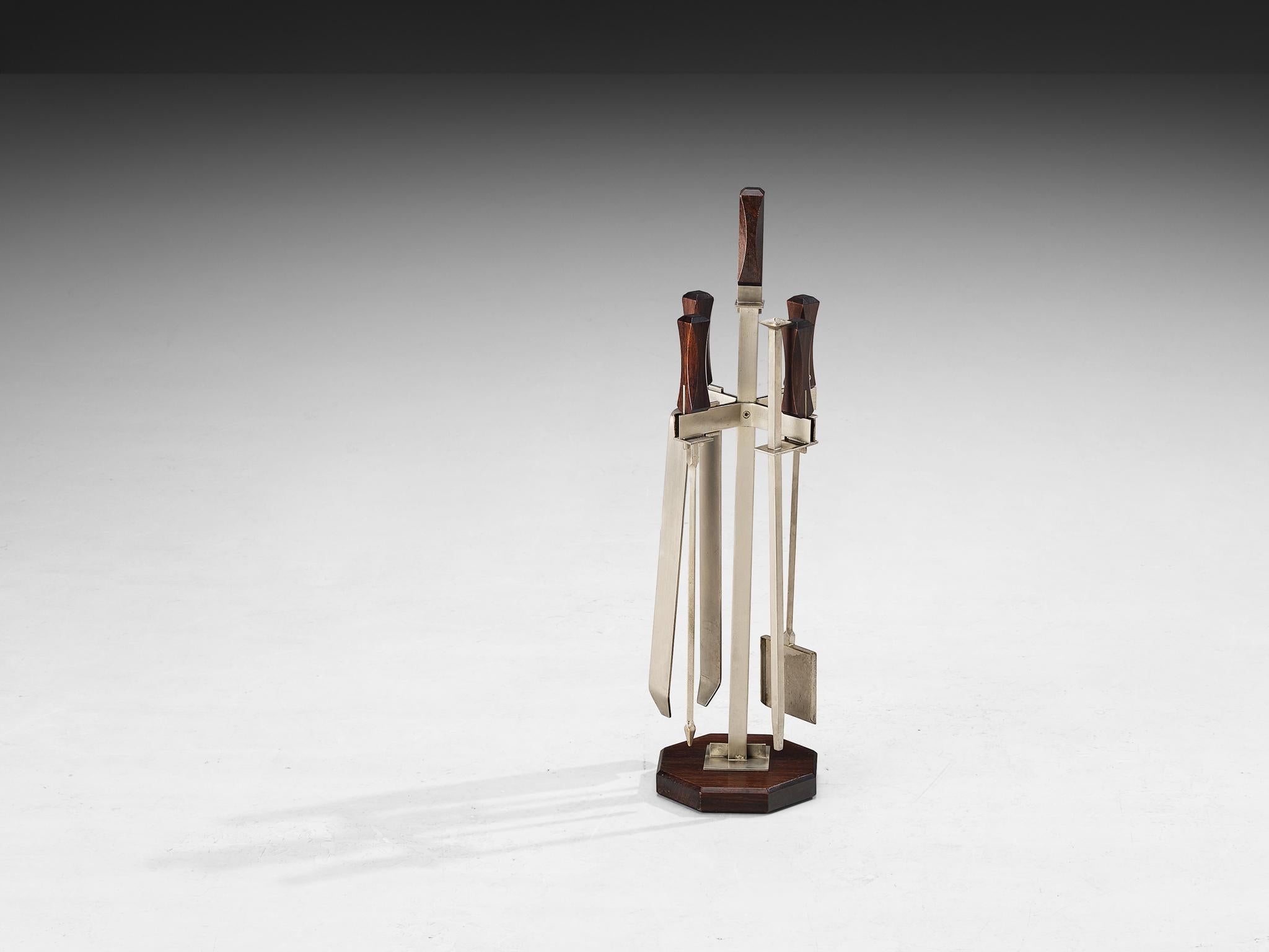 Ico Parisi for Stildomus Selezione, 'Altair' fireplace tools with standard, model '2001', nickel-plated brass, wood, steel, Italy, 1959

The Altair design is a rare creation by Ico Parisi and produced by the Italian company Stildomus, a furniture