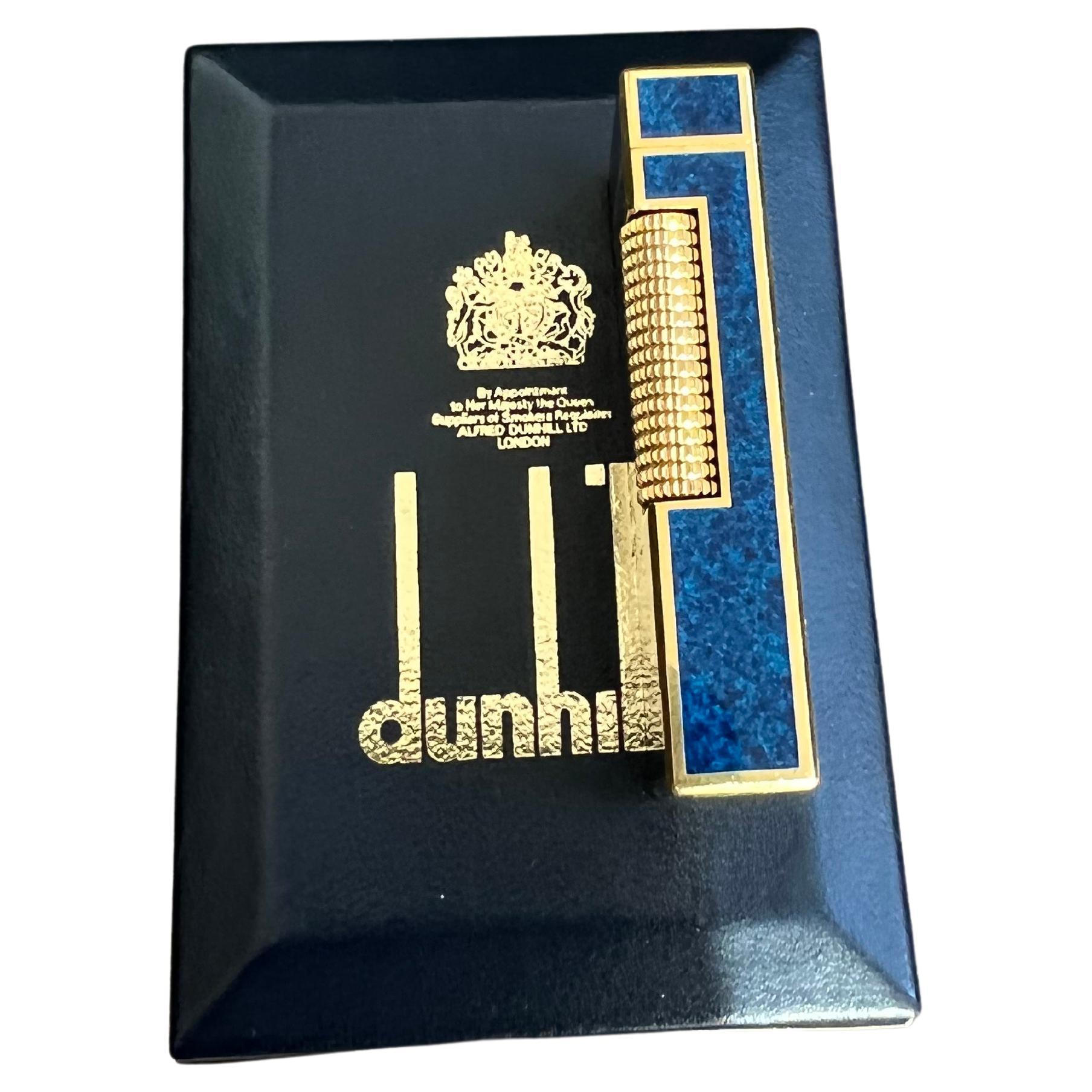 Beautiful, Elegant and Chic Rare Iconic Vintage Dunhill Gold Plated Marble Blue Lacquer Swiss Made Lighter.
This 1980s  Vintage Dunhill is gold plated and has a Blue lacquer Swiss Made lighter In mint condition.
Works perfectly. 
18K gold plating