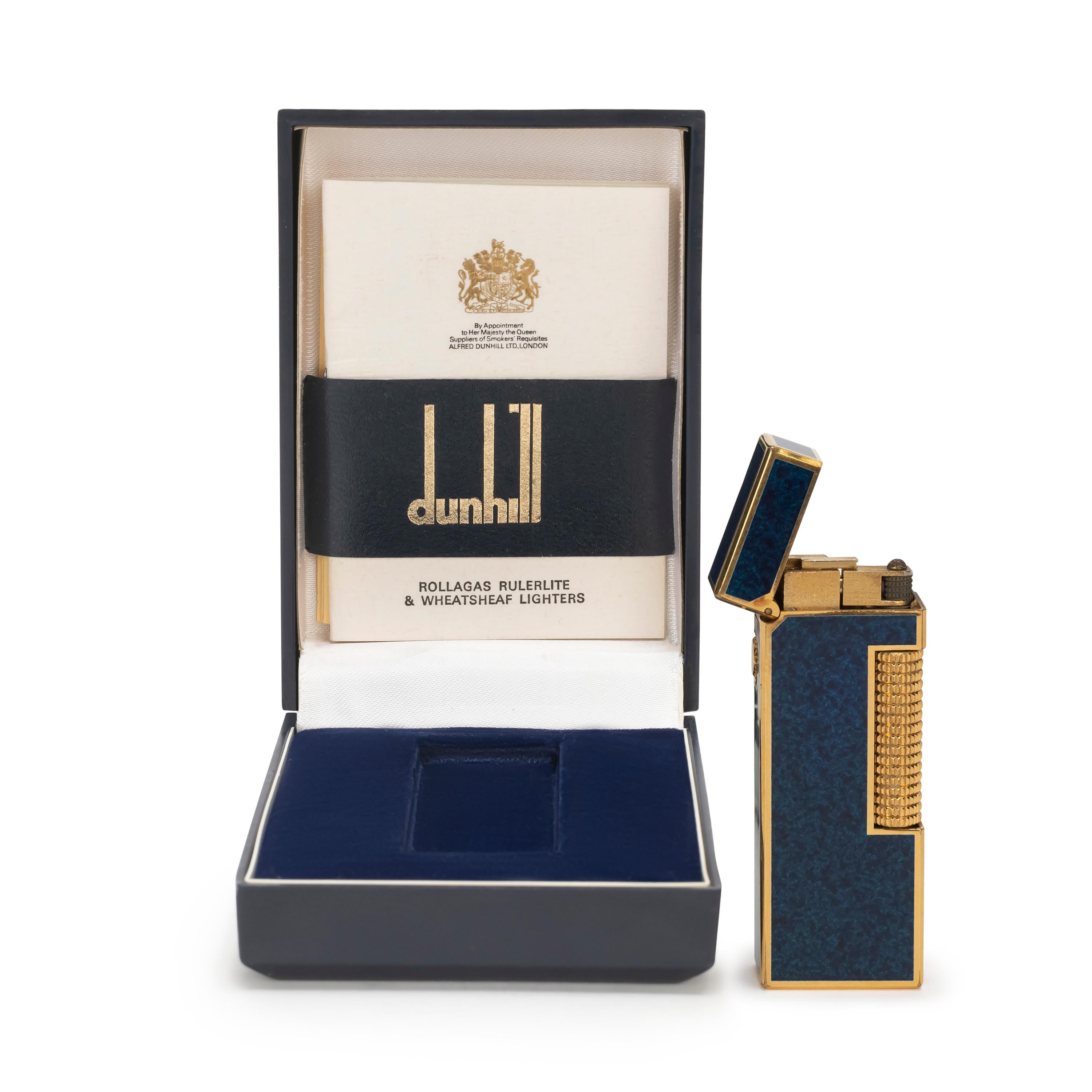 Elegant and Chic Rare Iconic Vintage Dunhill Gold Plated and Dark Blue Lacquer Swiss Made Lighter.
This 1970s Vintage Dunhill is gold plated and has a dark Blue lacquer Swiss Made lighter In mint condition.
Works perfectly. 
Iconic and beautifully