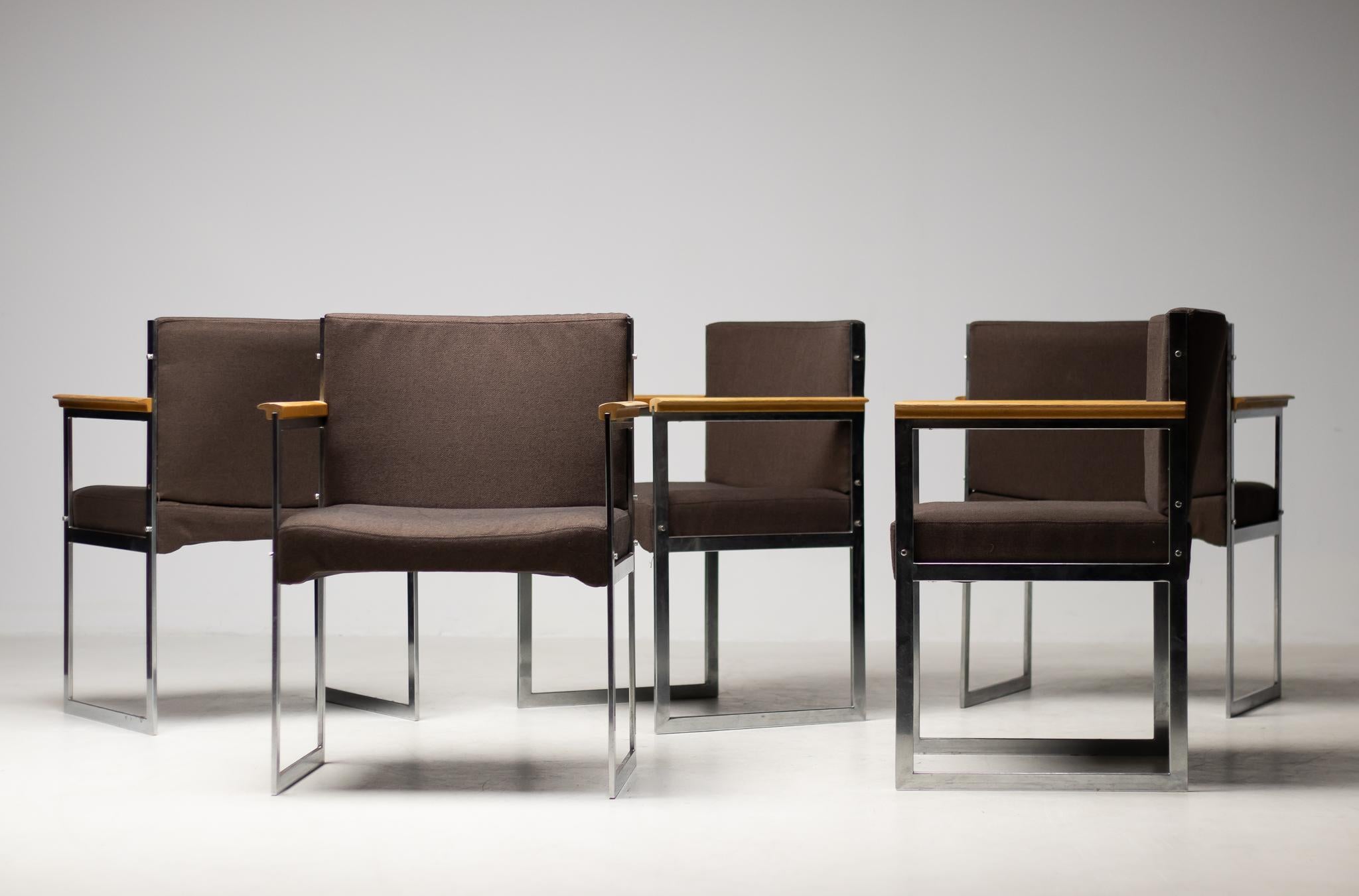 Distinguished armchairs with chromed flat steel frame and armrests in rosewood, designed by Illum Wikkelsø.
Seat and back in brown wool, re-upholstery available upon request.
Five chairs available, priced individually.
Manufactured by P.