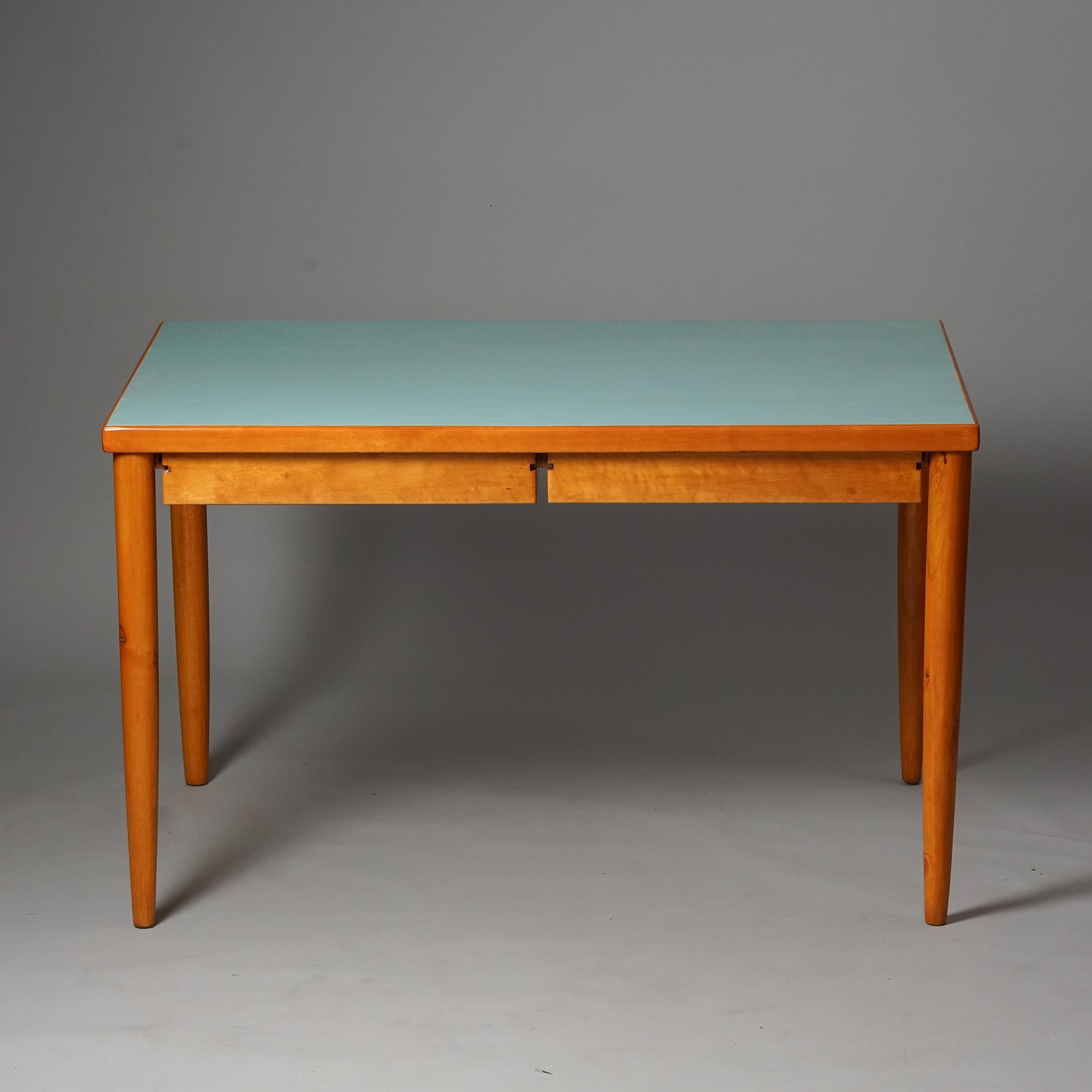 Rare Ilmari Tapiovaara desk, Domus Academica student house, 1940s. Birch with painted table top. Good vintage condition, patina consistent with age and use. Beautiful minimalistic design. Drawers can be used on both sides.

Yrjö Ilmari Tapiovaara