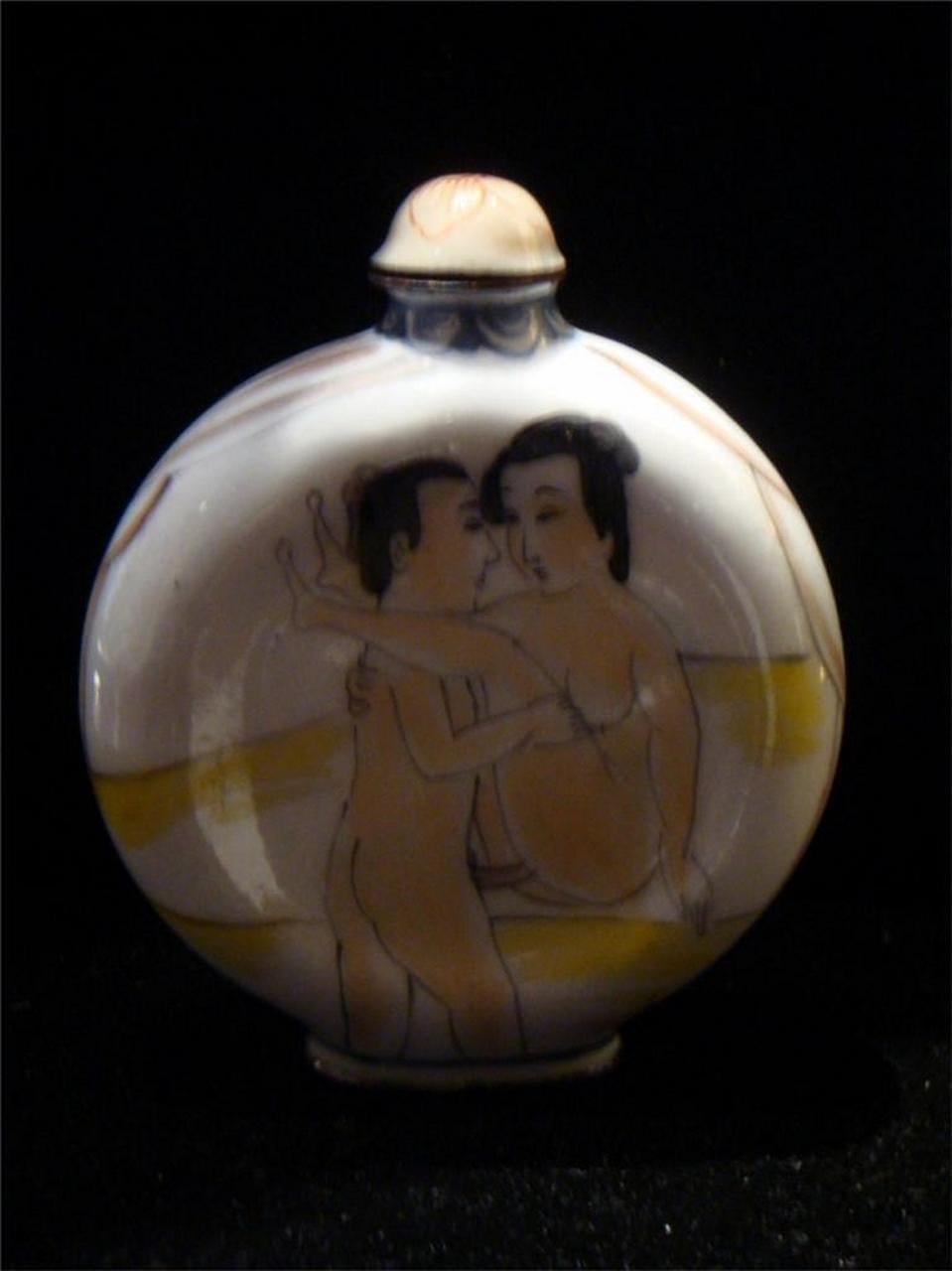 The Following Item we are offering is an Elaborately Decorated Spectacular Estate Hand Carved and Handpainted Painted Porcelain Chinese Erotic Snuff Bottle. Taken out of an Private Sutton Place Collection in NYC. Originally Priced at $950. Truly an