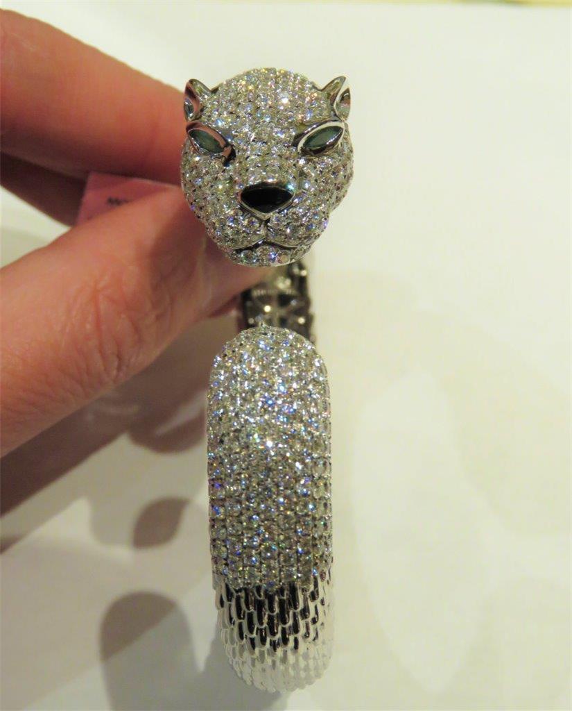 The Following Item we are offering is this Beautiful Rare Important Estate 18KT Gold Rare Certified Brilliant Fancy Diamond Panther Cuff. Cuff is comprised of Magnificent Rare Natural Rare Fancy Diamonds in the form of a Panther. The Eyes set with 2