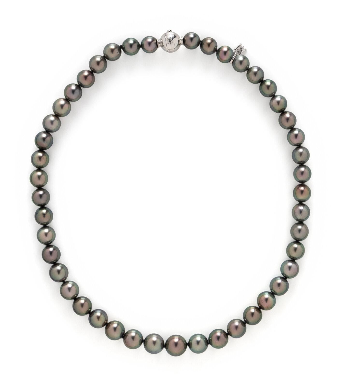 The Following Item we are offering is this Beautiful Rare Important 18KT Gold Fancy Gray Tahitian Pearl Necklace. Necklace is comprised of graduating Gray cultured pearls measuring approximately 8.5 - 10.5mm, with an 18KT White Gold clasp. Approx 17