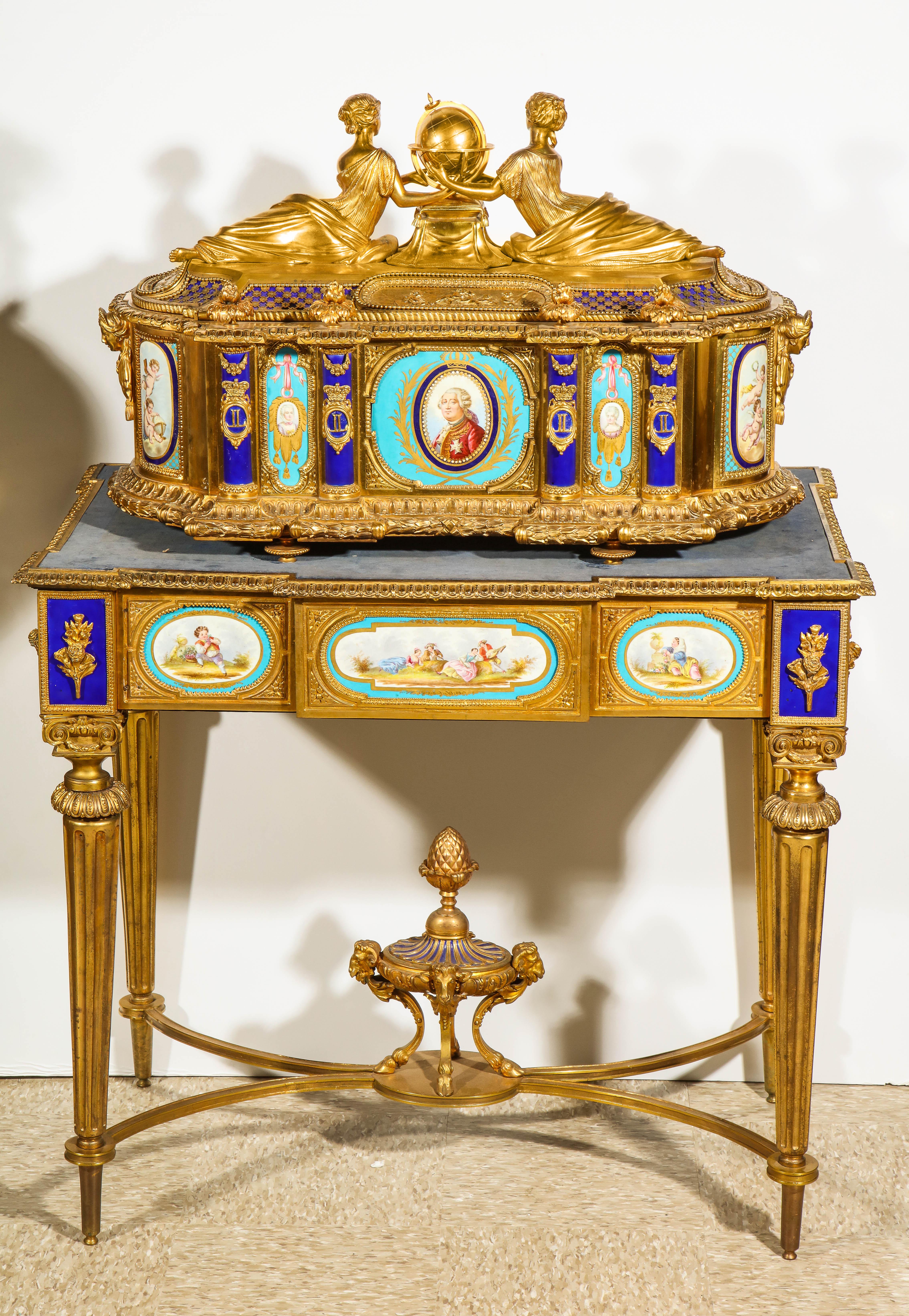 A rare and important French ormolu/bronze and Sevres style turquoise porcelain jewelry box casket on matching French ormolu/bronze table with Sevres style porcelain plaques.

Of palatial / monumental size!

