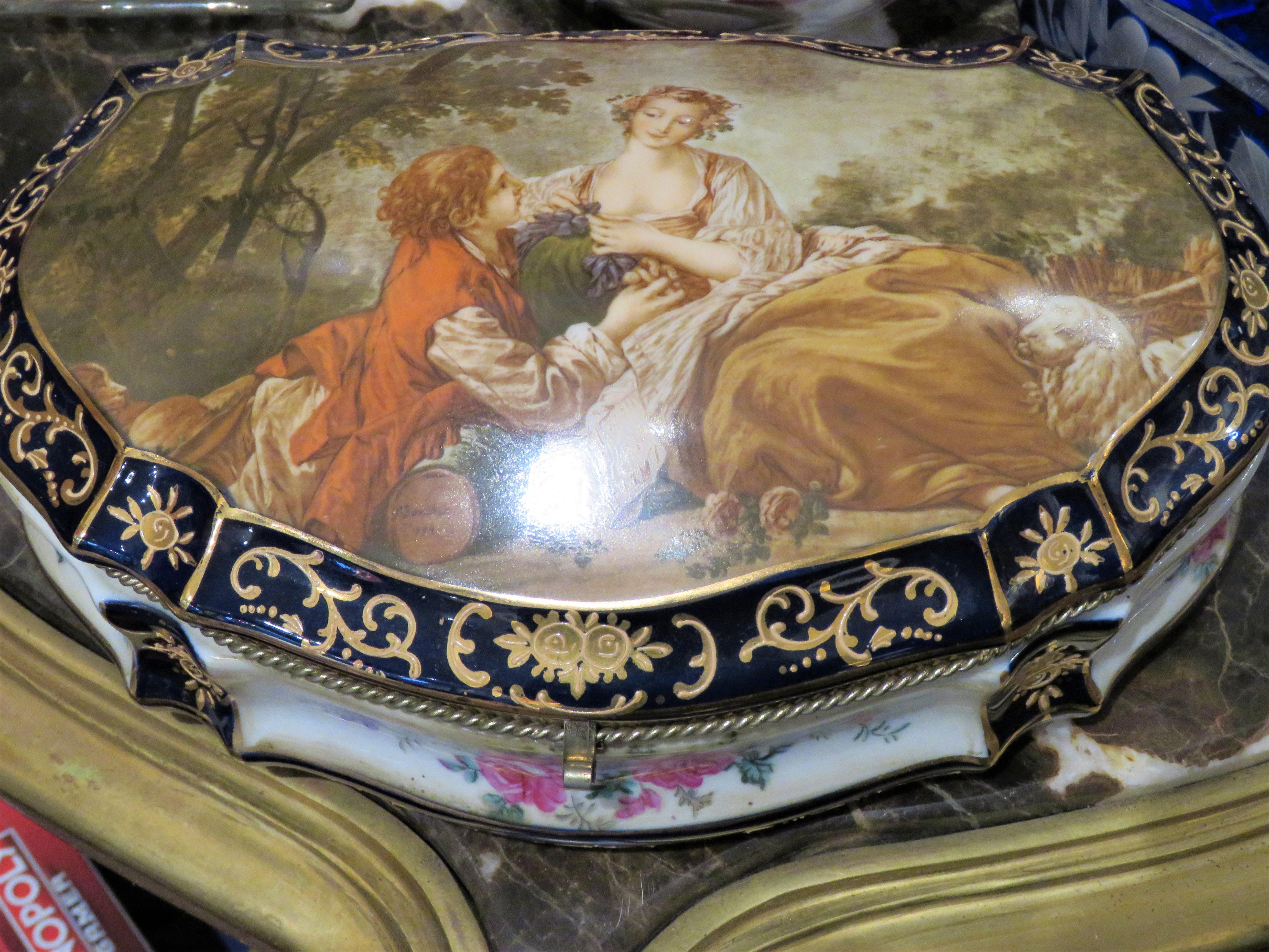 The Following Items we are offering is a Magnificent Rare Jewelry Casket Box Sevres Porcelain with Gilt Bronze Mounting. Center of Box Top is Finely Detailed with a Beautiful Portrait of Young Lovers. Taken out of an Important New York City Sutton