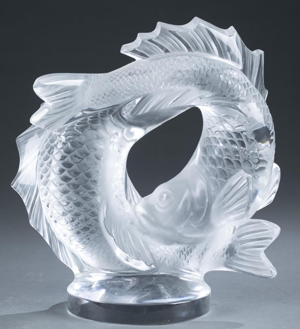 The Following Items we are offering is an Estate Signed and Numbered Double Intertwined Lalique Fish Sculpture. Signed with etched Lalique France signature on base. Gallery Retail $6500. 