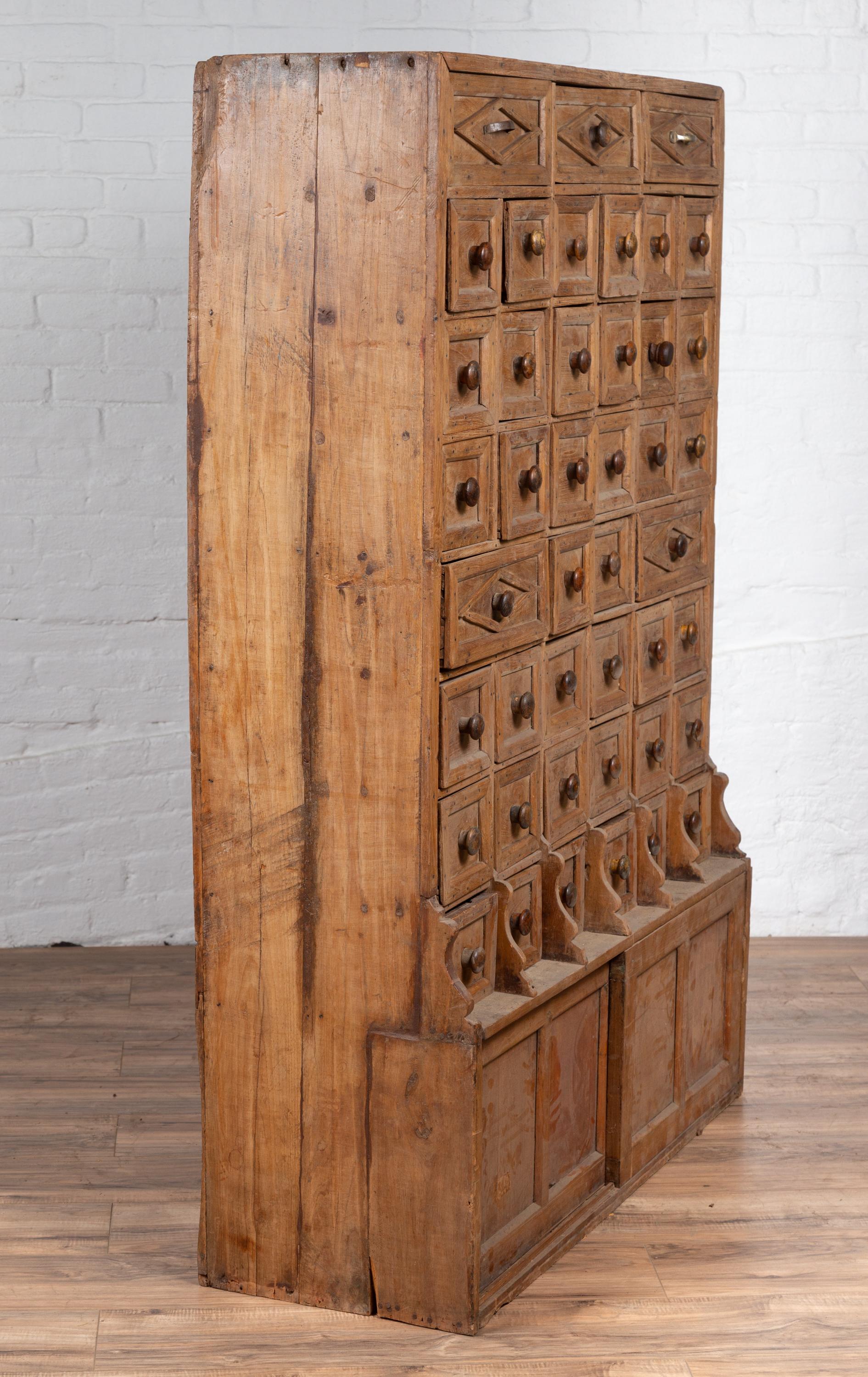 Rare Indian Antique Apothecary Cabinet with Multiple Drawers and Sliding Doors 2