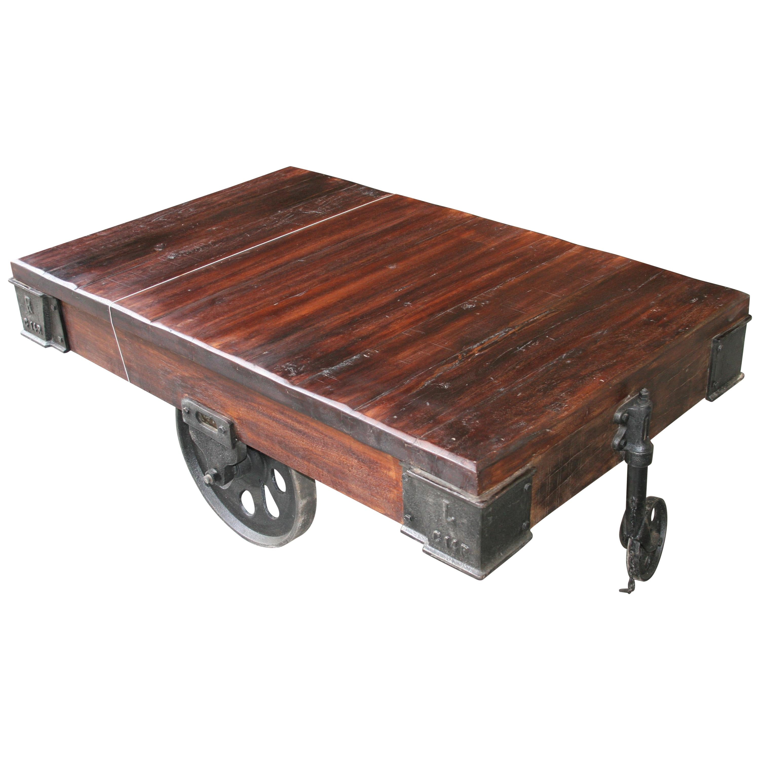 Rare Industrial Type Iron and Teak Wood Coffee Table with Iron Wheels For Sale