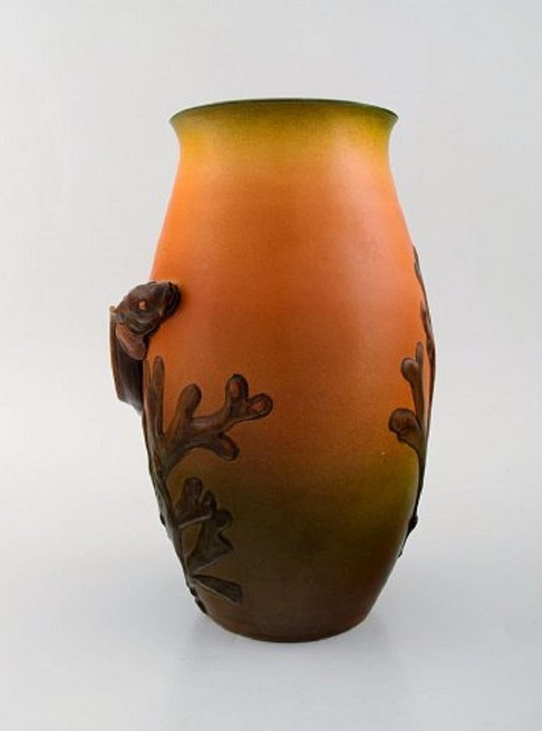 Rare Ipsen's, Denmark Art Nouveau ceramic vase with eelpout and seaweed in relief, early 20th century.
Measures 27.5 x 17 cm.
In very good condition.
Stamped.
Model number 353.