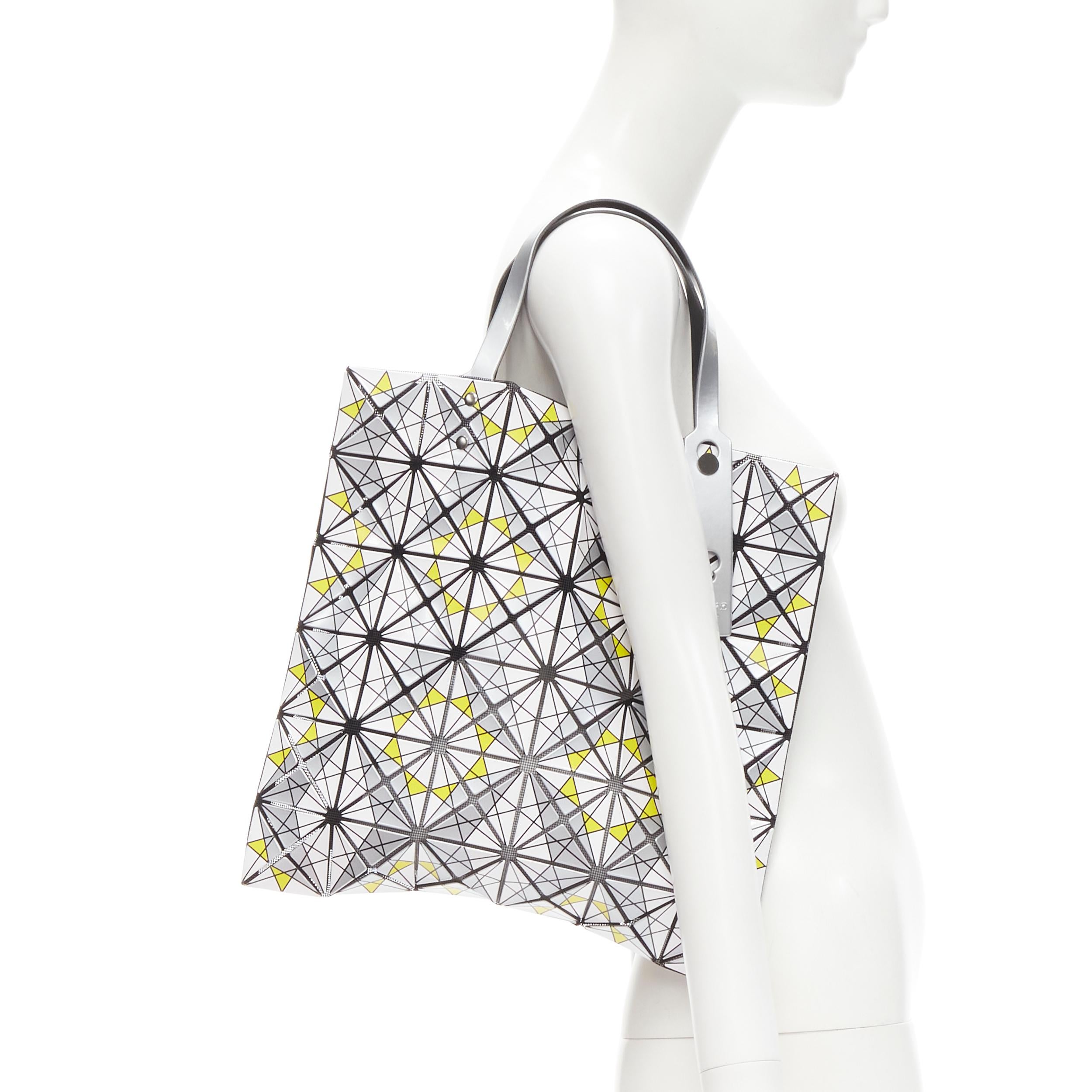 are ISSEY MIYAKE BAO BAO Prism yellow white silver geometric print tote bag 
Reference: CLCN/A00002 
Brand: Issey Miyake 
Model: Prism 
Collection: Bao Bao 
Material: PVC 
Color: Silver 
Pattern: Geometric 
Extra Detail: Adjustable handle length