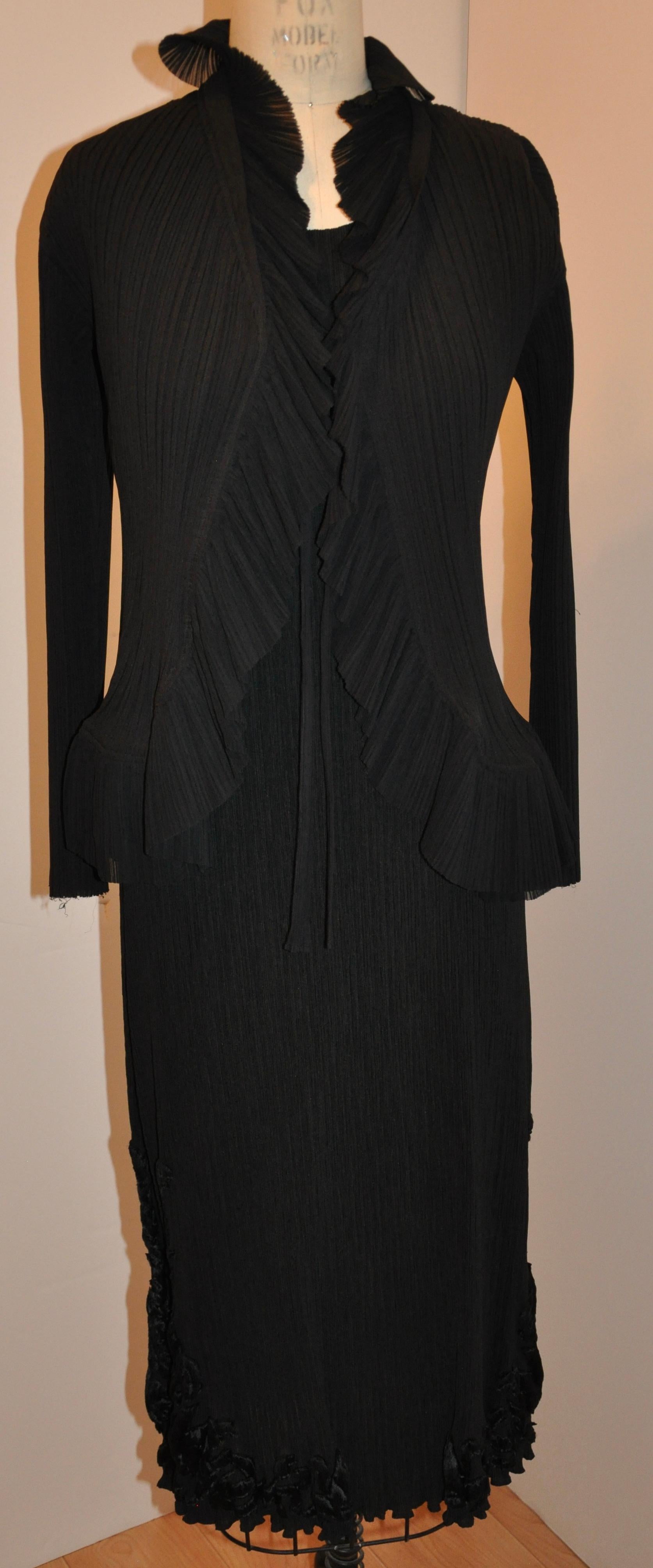    This wonderfully rare Issey Miyake/Bergdorf Goodman jet-black accented with floral velvet dress is matched with an optional open-faced ruffled open jacket. The scoop neckline dress, slightly flared, is embellished with detailed floral patterned
