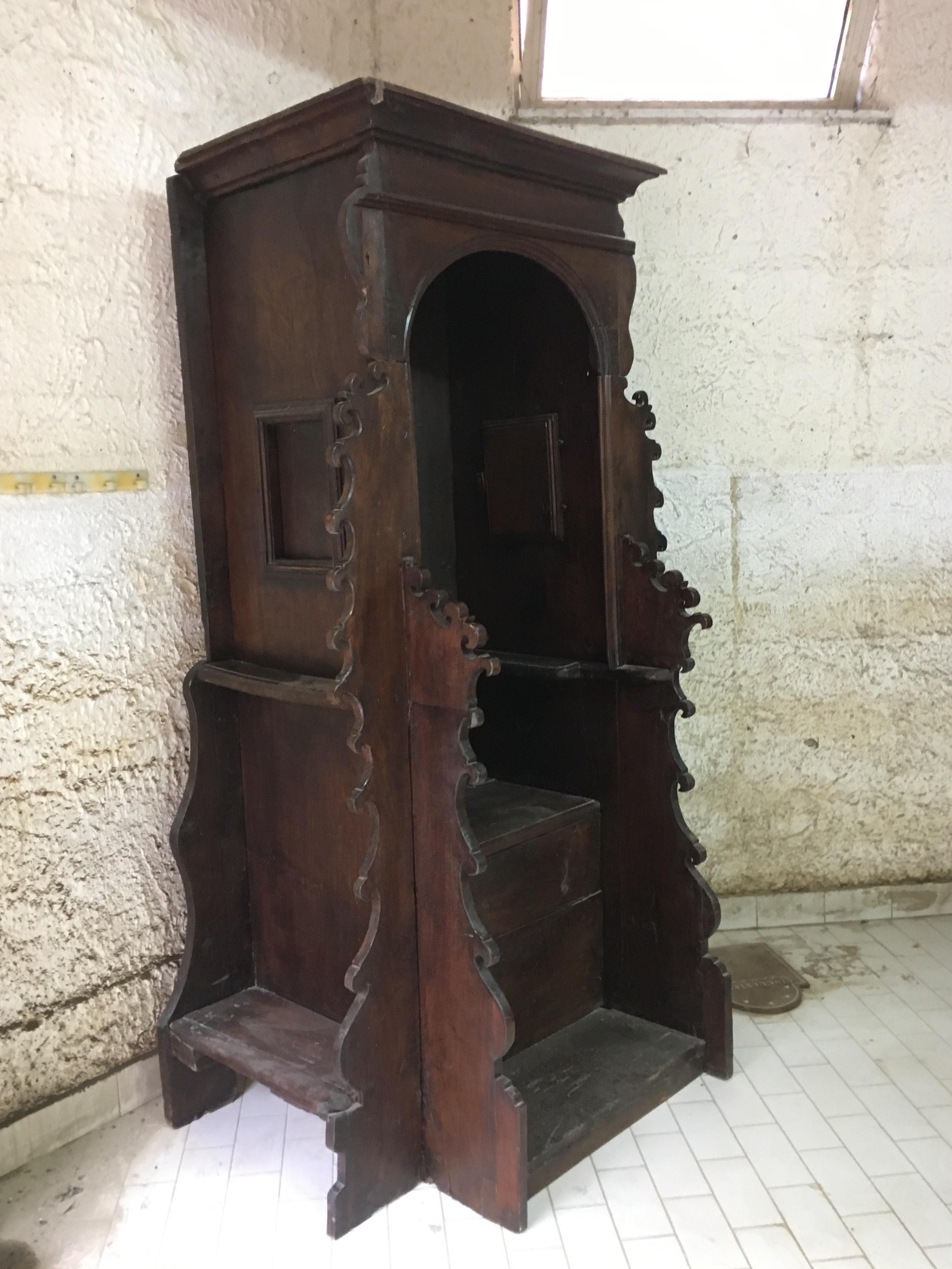 Rare original carved walnut confessional from the 1500s.
Suitable as a bookcase, bar cabinet or for its original job.