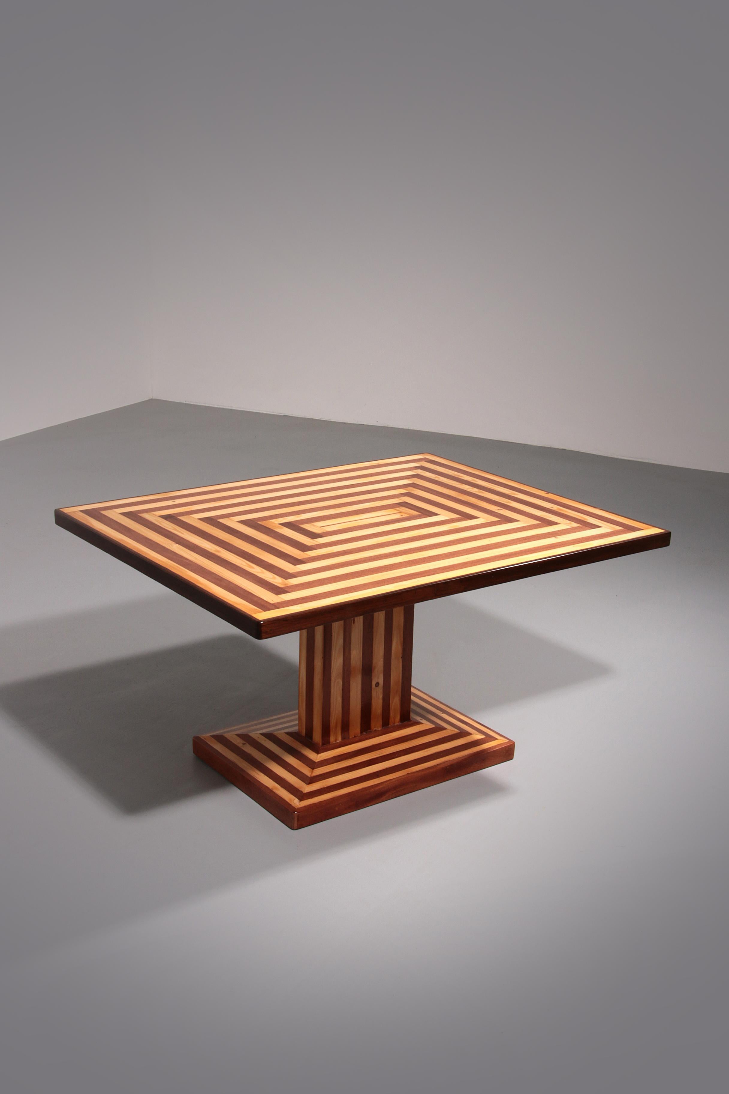 Exceptional and rare Italian coffee table from the 1970s crafted from a refined combination of maple and mahogany wood featuring a striking sculptural design that captures the essence of Italian design from the era a true statement piece that adds