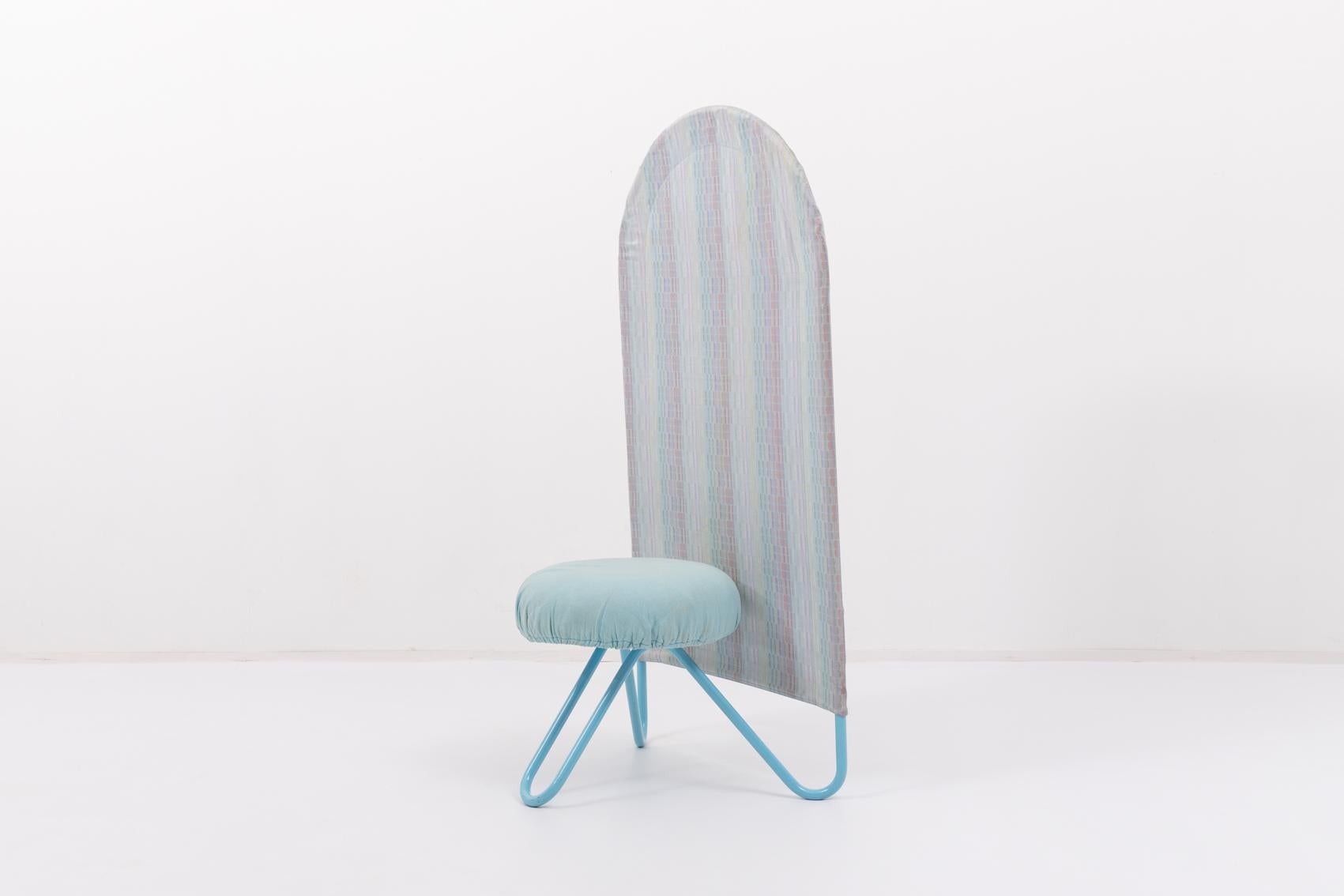 Very rare high back chair produced by Bonaldo in 1980’s. It features light blue coated tubular steel frame with removable fabric cover dressed on the backrest. It also has a removable fabric seat cover.

Condition
Good, age related wear and