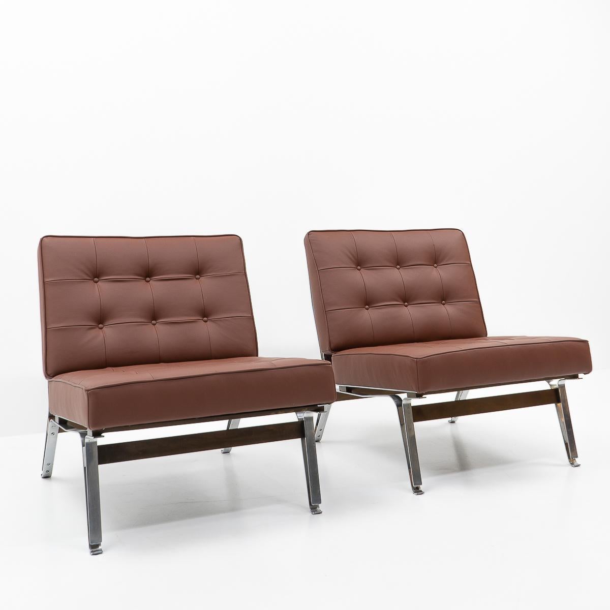 A pair of “856” lounge chairs by Ico Parisi for Cassina, produced during the 1950s in Italy. 

The chairs have been beautifully re-upholstered in new dark brown semi-aniline leather, while ensuring the original style of the pillows was maintained.